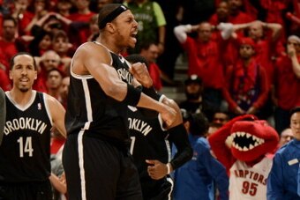 TORONTO, ON - MAY 4: Paul Pierce #34 of the Brooklyn Nets celebrates after winning against the Toronto Raptors in Game Seven of the Eastern Conference Quarterfinals during the NBA Playoffs at the Air Canada Centre on May 4, 2014 in Toronto, Ontario, Canad