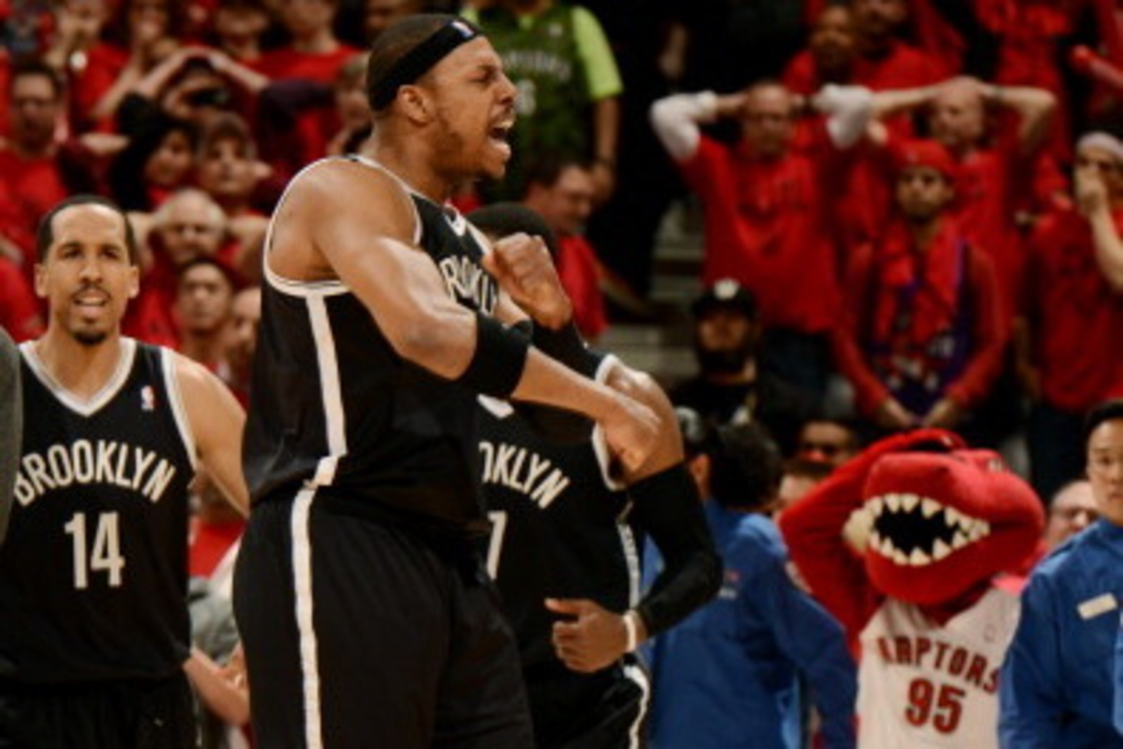 TORONTO, ON - MAY 4: Paul Pierce #34 of the Brooklyn Nets celebrates after winning against the Toronto Raptors in Game Seven of the Eastern Conference Quarterfinals during the NBA Playoffs at the Air Canada Centre on May 4, 2014 in Toronto, Ontario, Canad