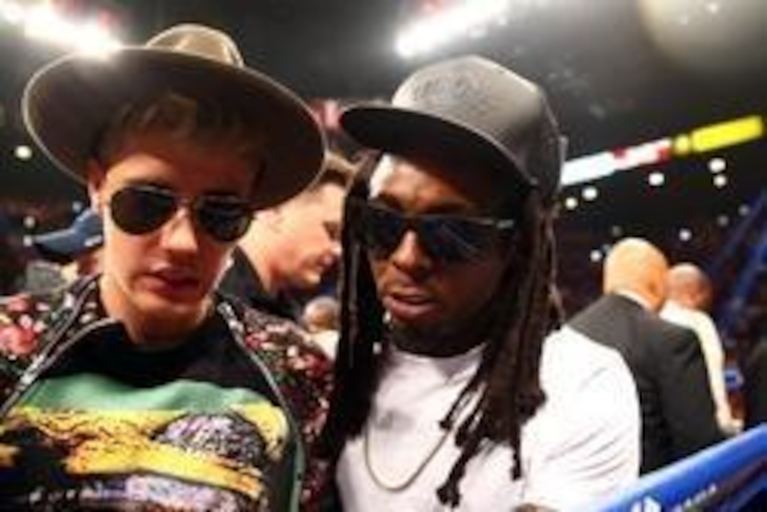 May 3, 2014; Las Vegas, NV, USA; Recording artist Lil Wayne with Justin Bieber in attendance before Floyd Mayweather Jr. fights Marcos Maidana at MGM Grand. Mandatory Credit: Mark J. Rebilas-USA TODAY Sports