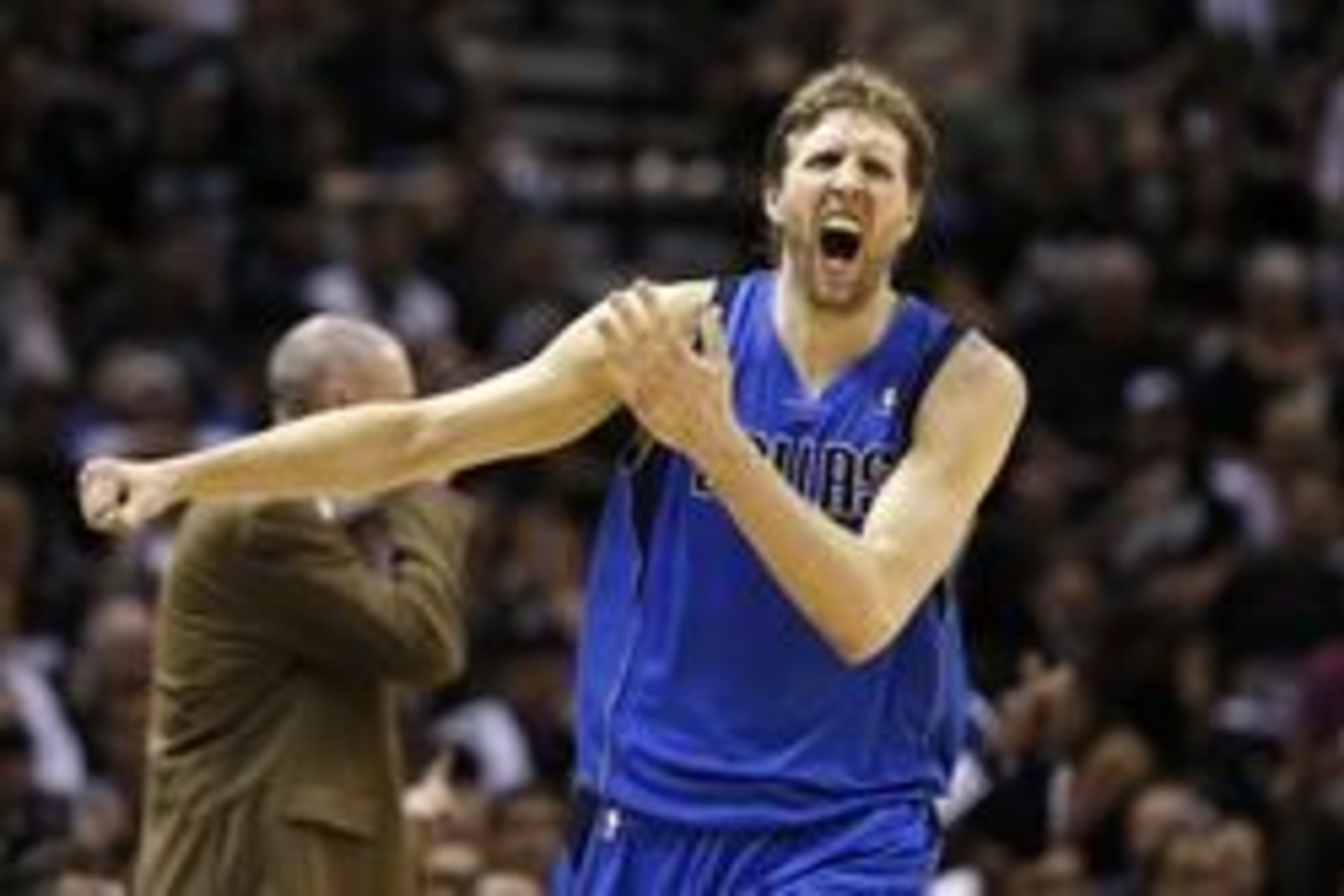 May 4, 2014; San Antonio, TX, USA; Dallas Mavericks forward Dirk Nowitzki (41) reacts against the San Antonio Spurs in game seven of the first round of the 2014 NBA Playoffs at AT&T Center. Mandatory Credit: Soobum Im-USA TODAY Sports May 4, 2014; San Antonio, TX, USA; Dallas Mavericks forward Dirk Nowitzki (41) reacts against the San Antonio Spurs in game seven of the first round of the 2014 NBA Playoffs at AT&T Center. Mandatory Credit: Soobum Im-USA TODAY Sports