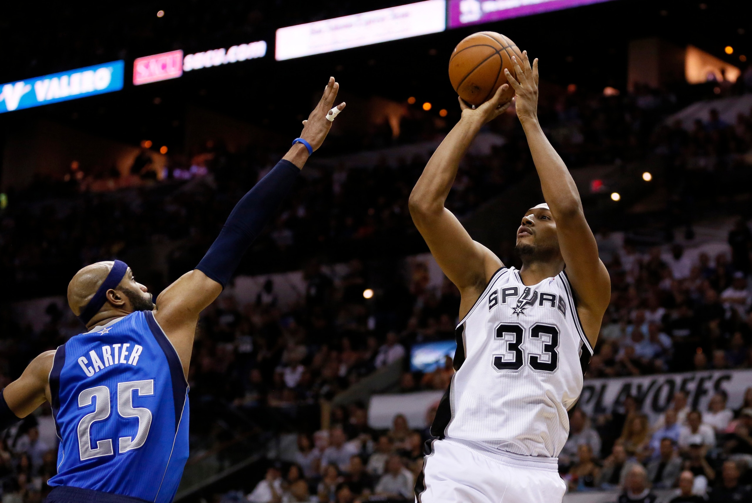 May 4, 2014; San Antonio, TX, USA; San Antonio Spurs forward Boris Diaw (33) shoots the ball over Dallas Mavericks guard Vince Carter (25) in game seven of the first round of the 2014 NBA Playoffs at AT&T Center. Mandatory Credit: Soobum Im-USA TODAY Spor