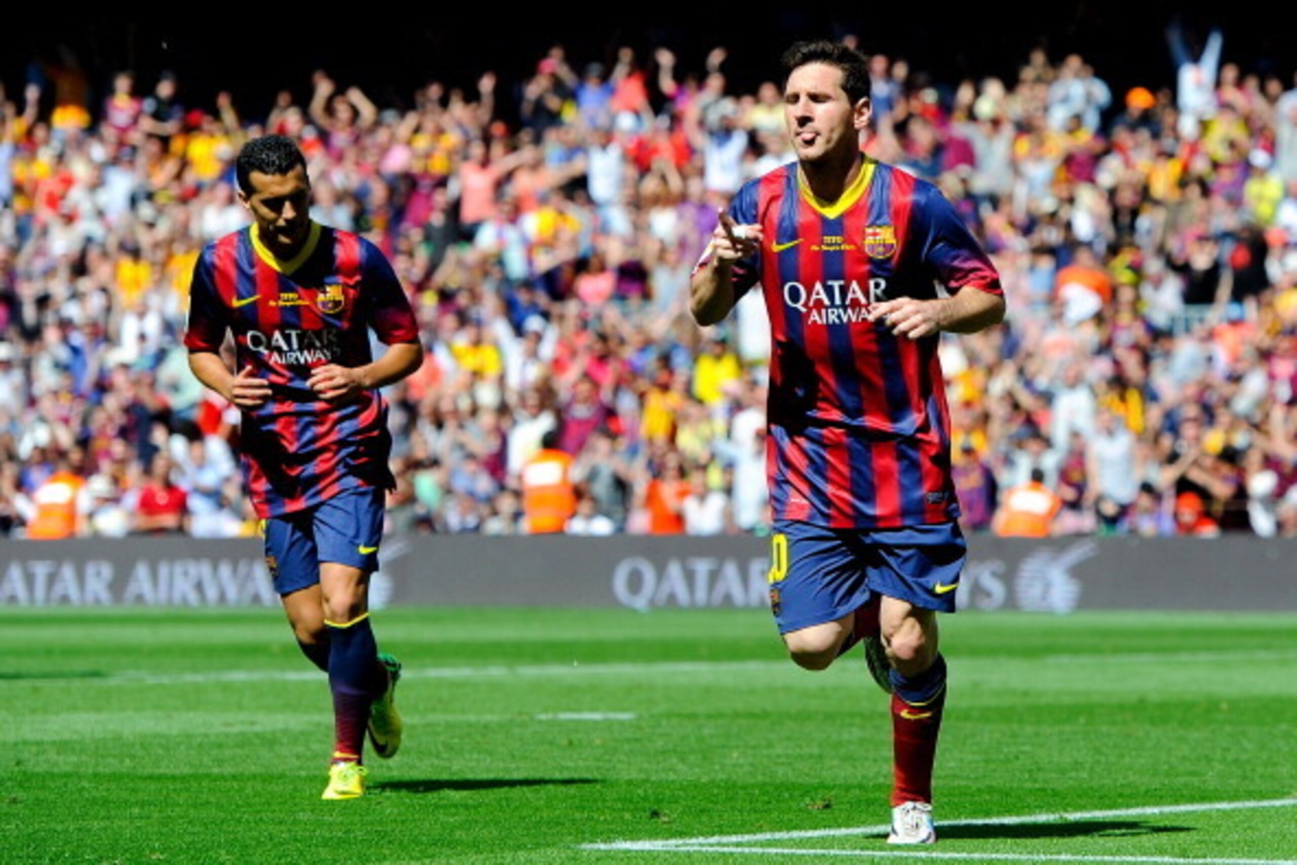 BARCELONA, SPAIN - MAY 03:  Lionel Messi of FC Barcelona celebrates after scoring the opening goal during the La Liga match between FC Barcelona and Getafe CF at Nou Camp on May 3, 2014 in Barcelona, Spain.  (Photo by David Ramos/Getty Images)