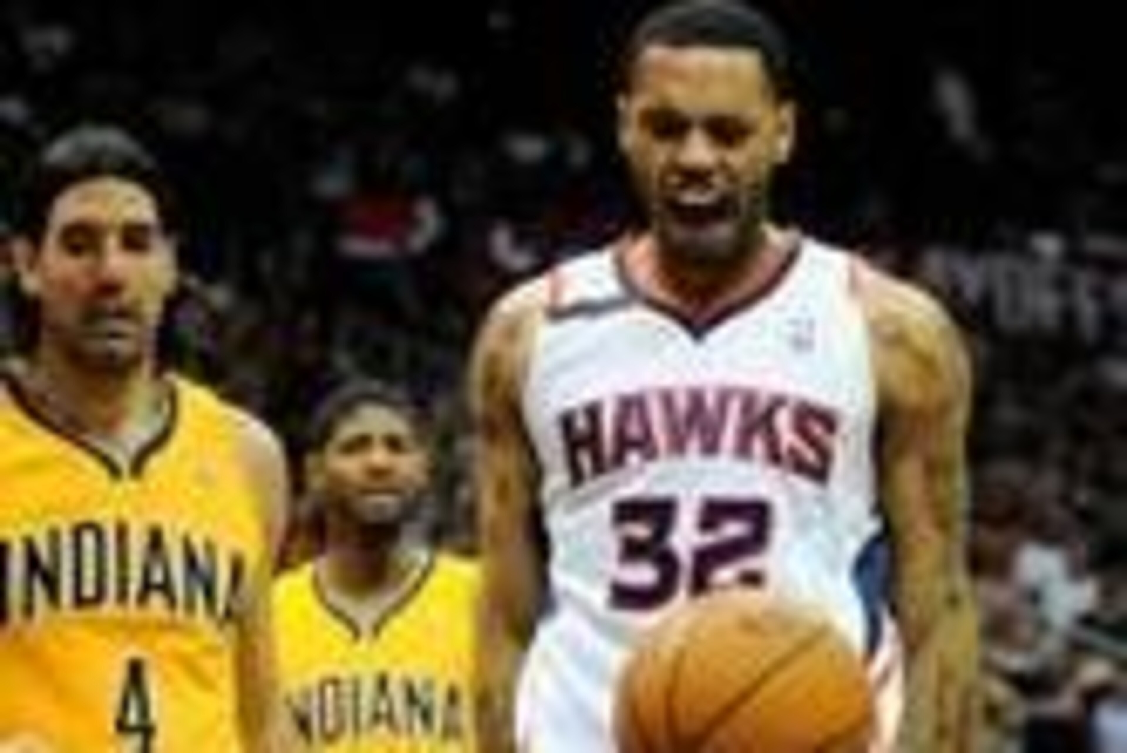 Apr 26, 2014; Atlanta, GA, USA; Atlanta Hawks forward Mike Scott (32) reacts after a basket in front of Indiana Pacers forward Luis Scola (4) during the first half in game four of the first round of the 2014 NBA Playoffs at Philips Arena. Mandatory Credit