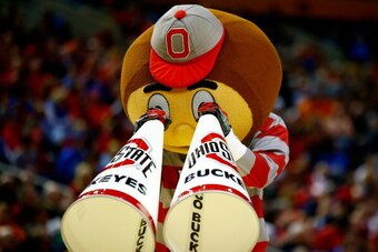 BUFFALO, NY - MARCH 20: The Ohio State Buckeyes mascot, Brutus Buckeye, performs during the second round of the 2014 NCAA Men's Basketball Tournament against the Dayton Flyers at the First Niagara Center on March 20, 2014 in Buffalo, New York.  (Photo by 