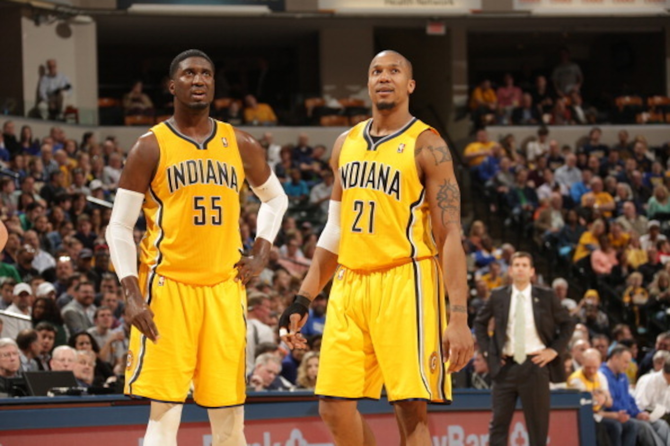 INDIANAPOLIS - MARCH 11: Roy Hibbert #55 and David West #21 of the Indiana Pacers look on during the game against the Boston Celtics at Bankers Life Fieldhouse on March 11, 2014 in Indianapolis, Indiana.  NOTE TO USER: User expressly acknowledges and agre