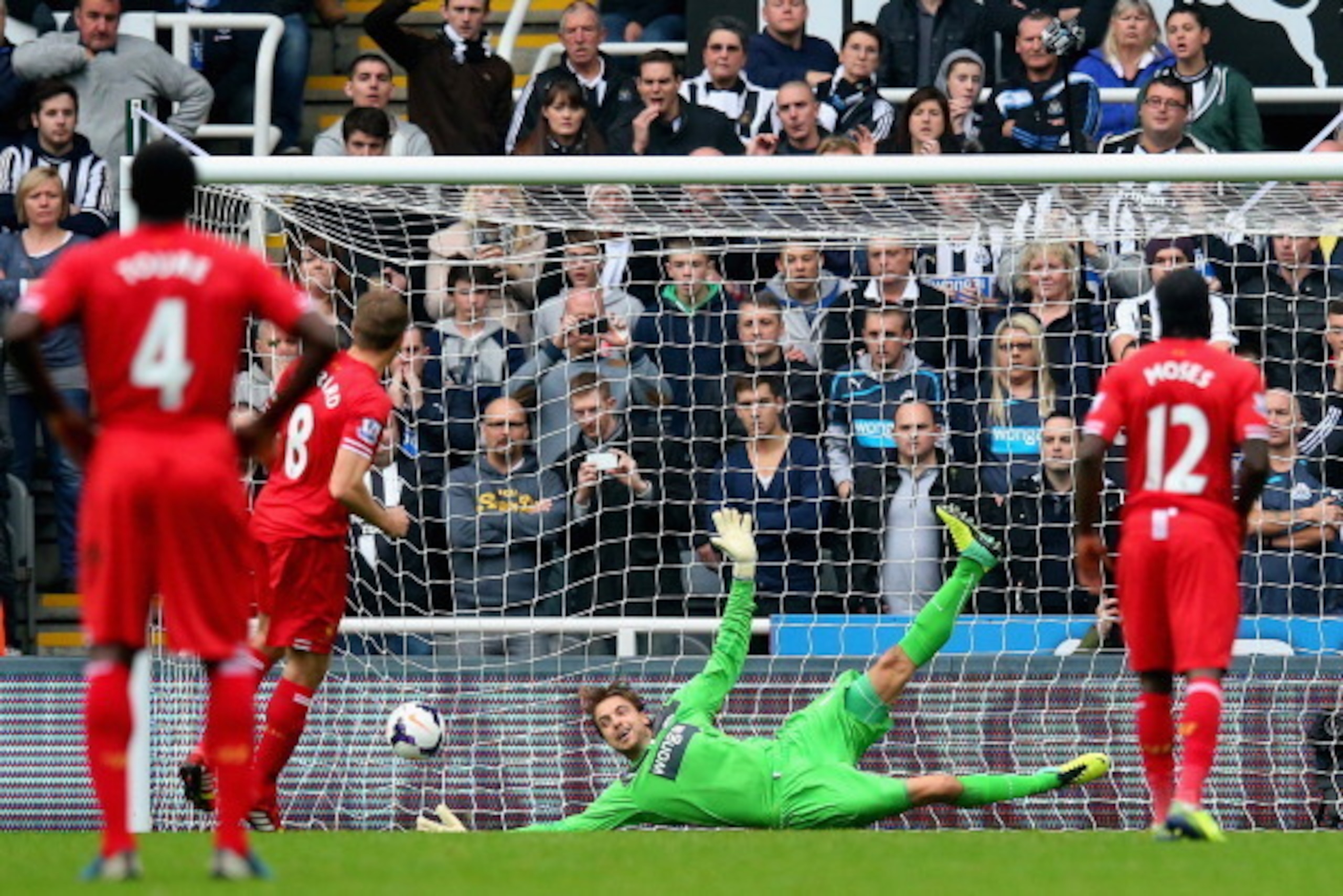 NEWCASTLE UPON TYNE, ENGLAND - OCTOBER 19:  Tim Krul of Newcastle United fails to stop Steven Gerrard of Liverpool scoring from the penalty spot during the Barclays Premier League match between Newcastle United and Liverpool at St James' Park on October 1