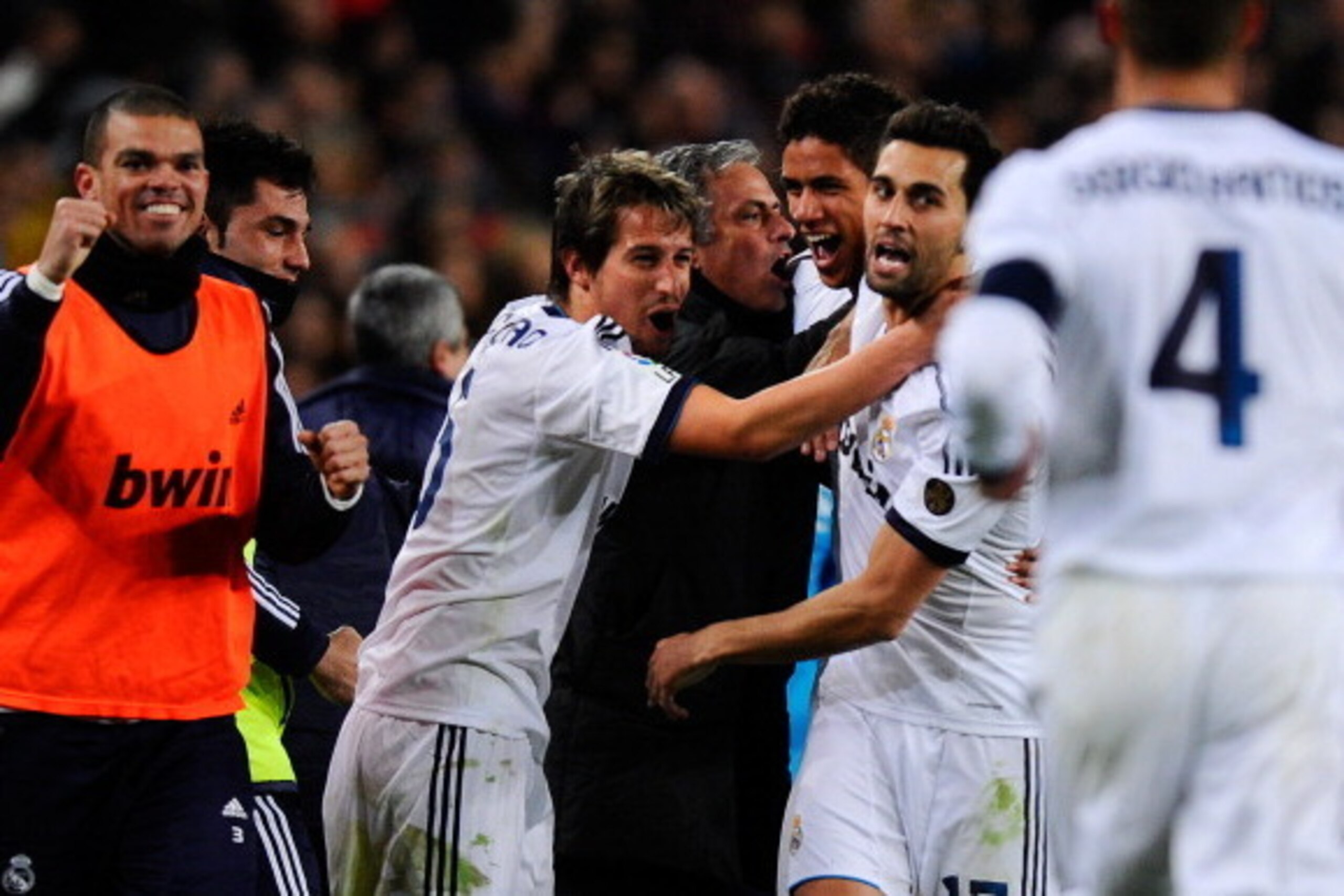 BARCELONA, SPAIN - FEBRUARY 26: Head coach Jose Mourinho of Real Madrid CF celebrates with Varane of Real Madrid CF after Varane scored his team's third goal during the Copa del Rey Semi Final second leg between FC Barcelona and Real Madrid at Camp Nou on