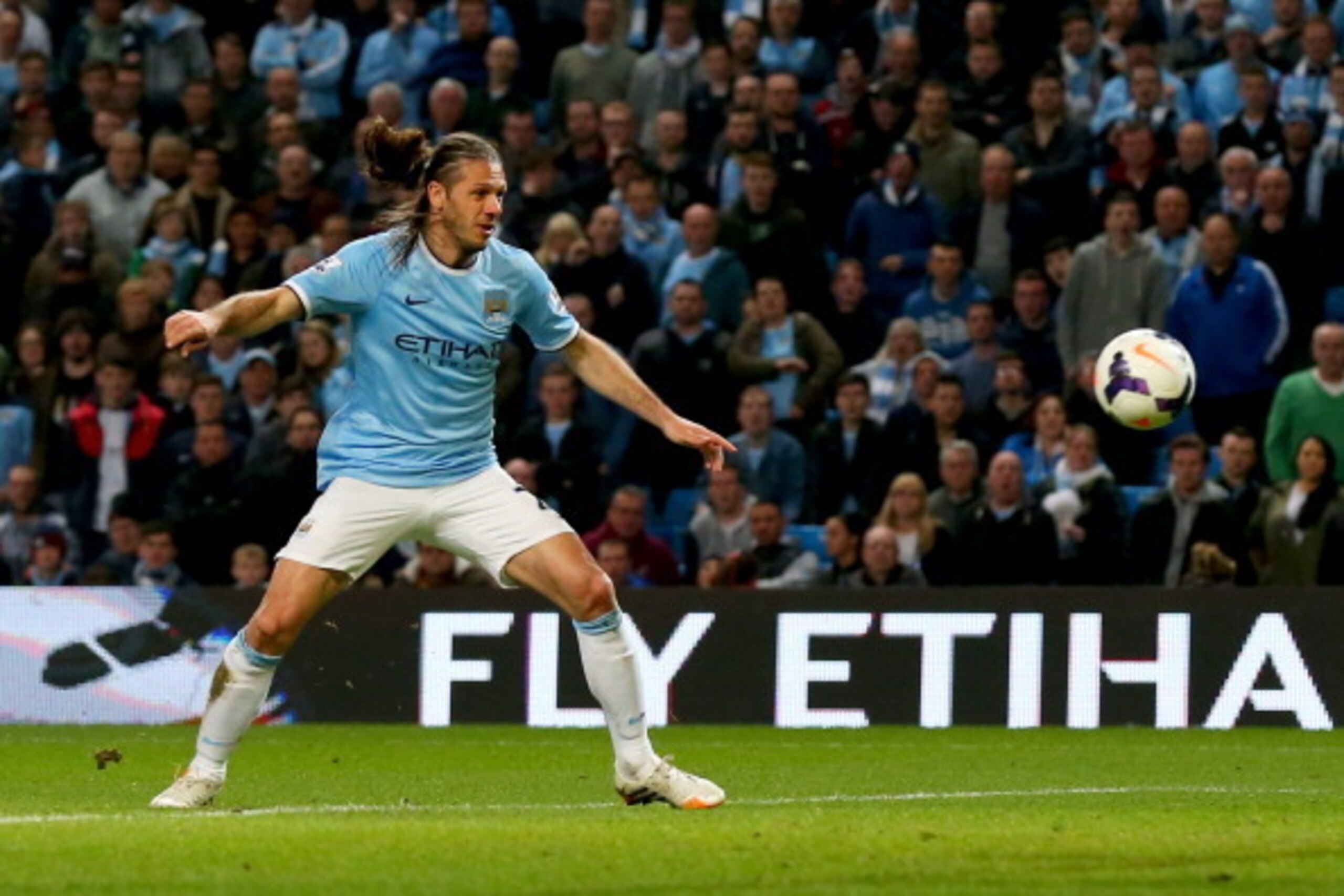 MANCHESTER, ENGLAND - APRIL 21:  Martin Demichelis of Manchester City scores their third goal during the Barclays Premier League match between Manchester City and West Bromwich Albion at Etihad Stadium on April 21, 2014 in Manchester, England.  (Photo by 
