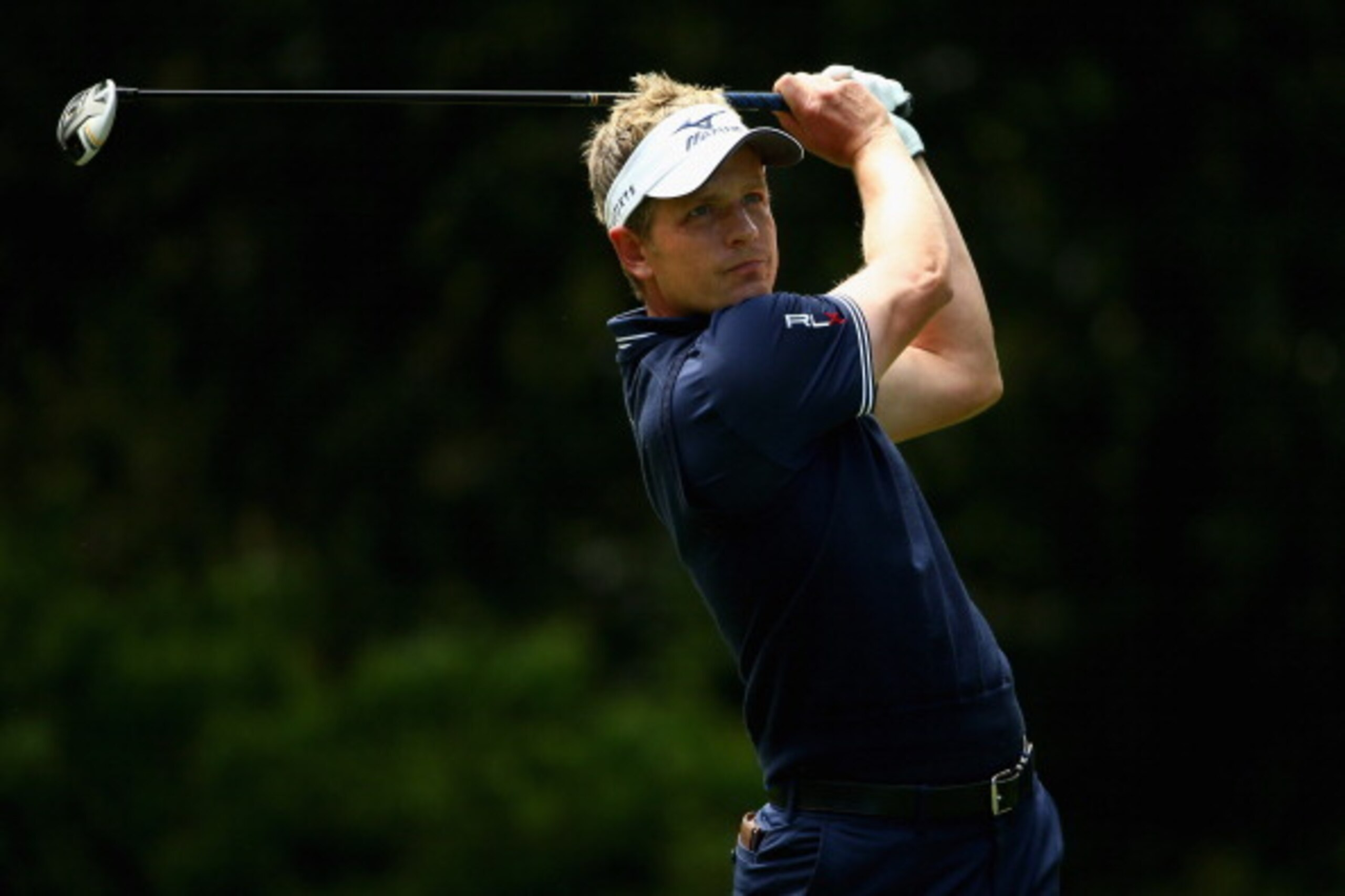 HILTON HEAD ISLAND, SC - APRIL 20: Luke Donald of England hits a tee shot on the 5th hole during the final round of the RBC Heritage at Harbour Town Golf Links on April 20, 2014 in Hilton Head Island, South Carolina.  (Photo by Streeter Lecka/Getty Images