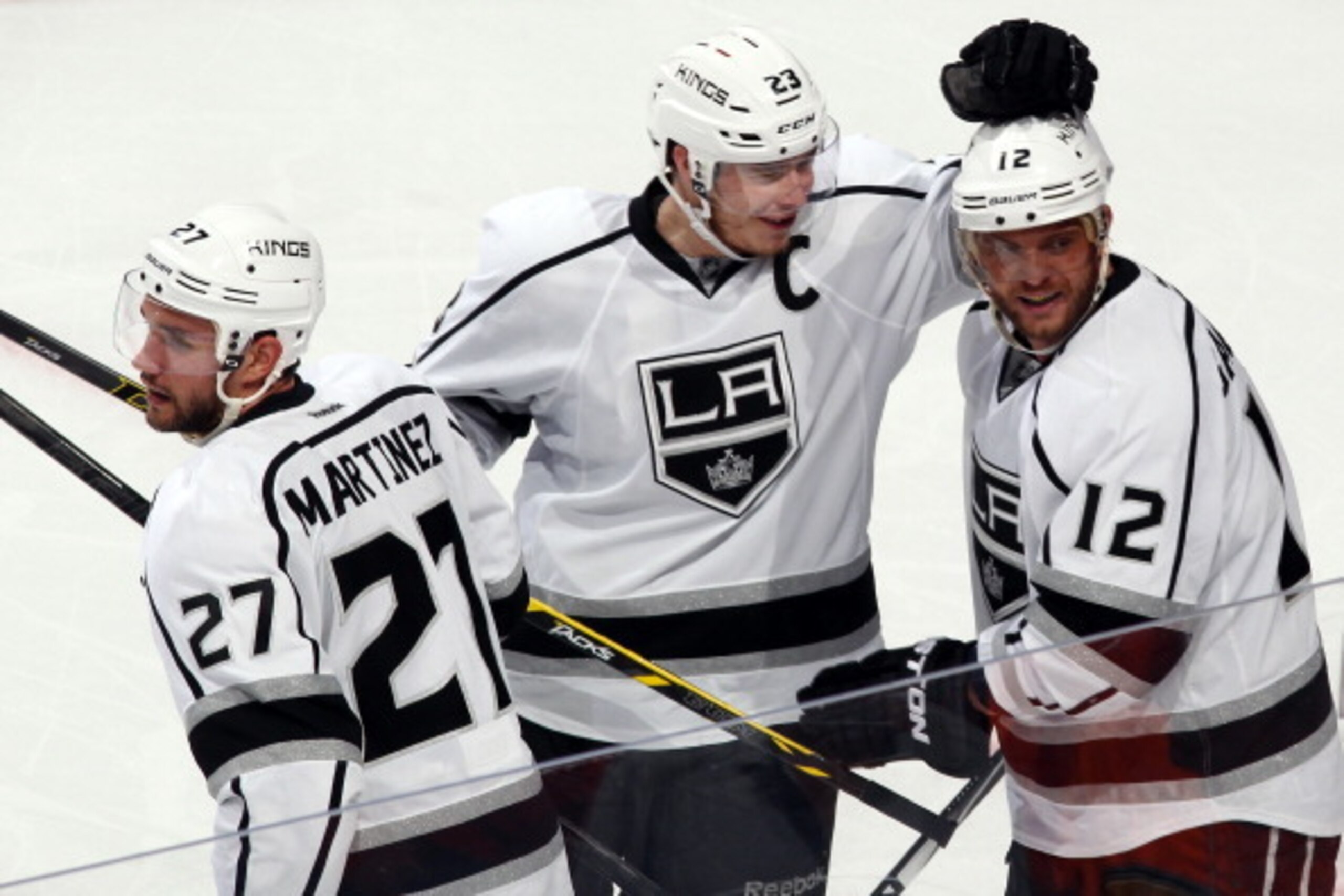 ANAHEIM, CA - MAY 3:  Alec Martinez #27, Dustin Brown #23 and Marian Gaborik #12 of the Los Angeles Kings celebrate Gaborik's game-winning goal scored against the Anaheim Ducks in Game One of the Second Round of the 2014 Stanley Cup Playoffs at Honda Cent