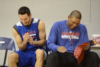 LA JOLLA, CA, OCTOBER 4: Head Coach Doc Rivers & J.J. Redick #4 of the Los Angeles Clippers share a moment in training camp at RIMAC Arena on October 4, 2013 in La Jolla, California. NOTE TO USER: User expressly acknowledges and agrees that, by downloadin