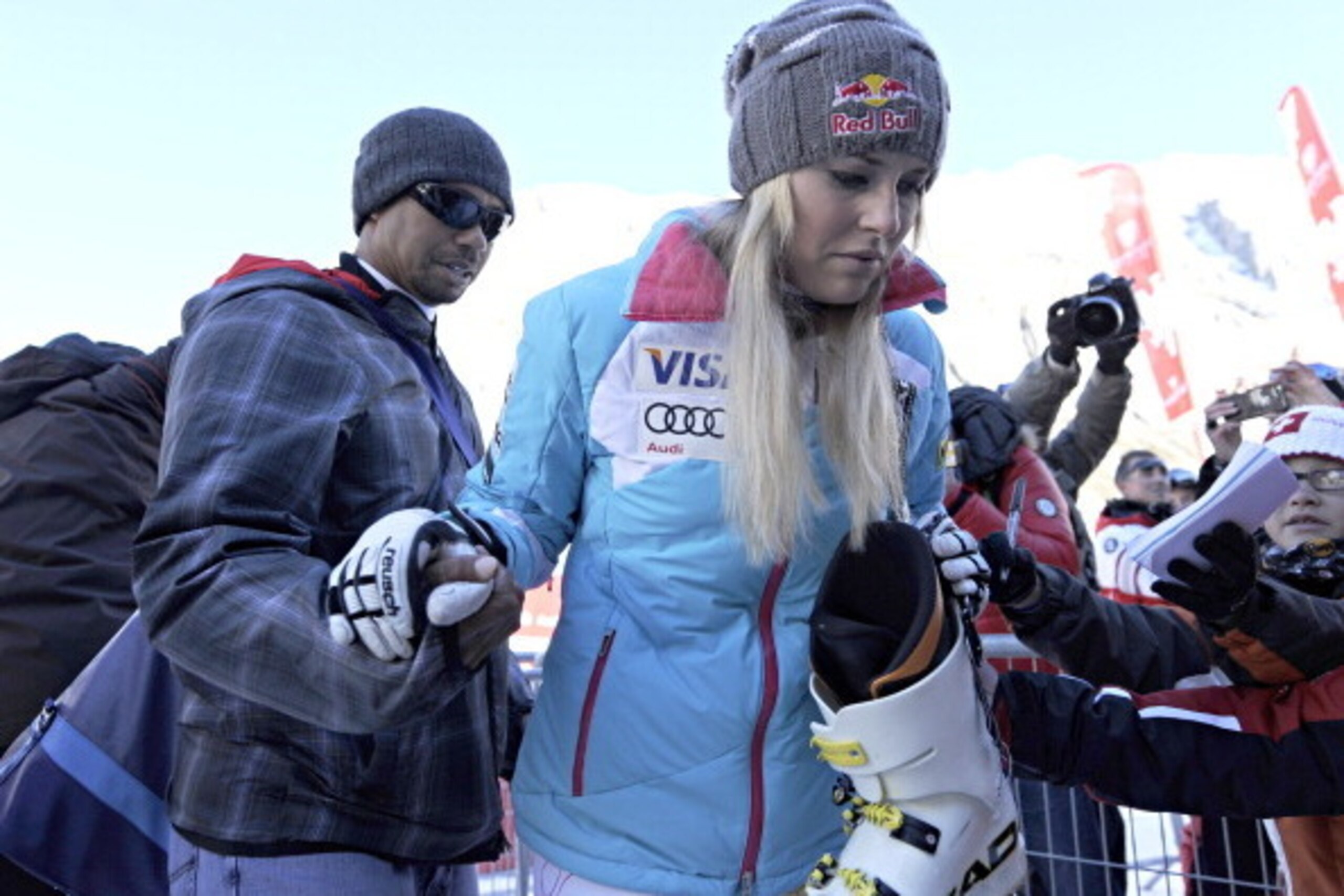 VAL D'ISERE, FRANCE - DECEMBER 21: (FRANCE OUT) Tiger Woods and Lindsey Vonn of USA during the Audi FIS Alpine Ski World Cup Women's Downhill on December 21, 2013 in Val d'Isere, France. (Photo by Michel Cottin/Agence Zoom/Getty Images)