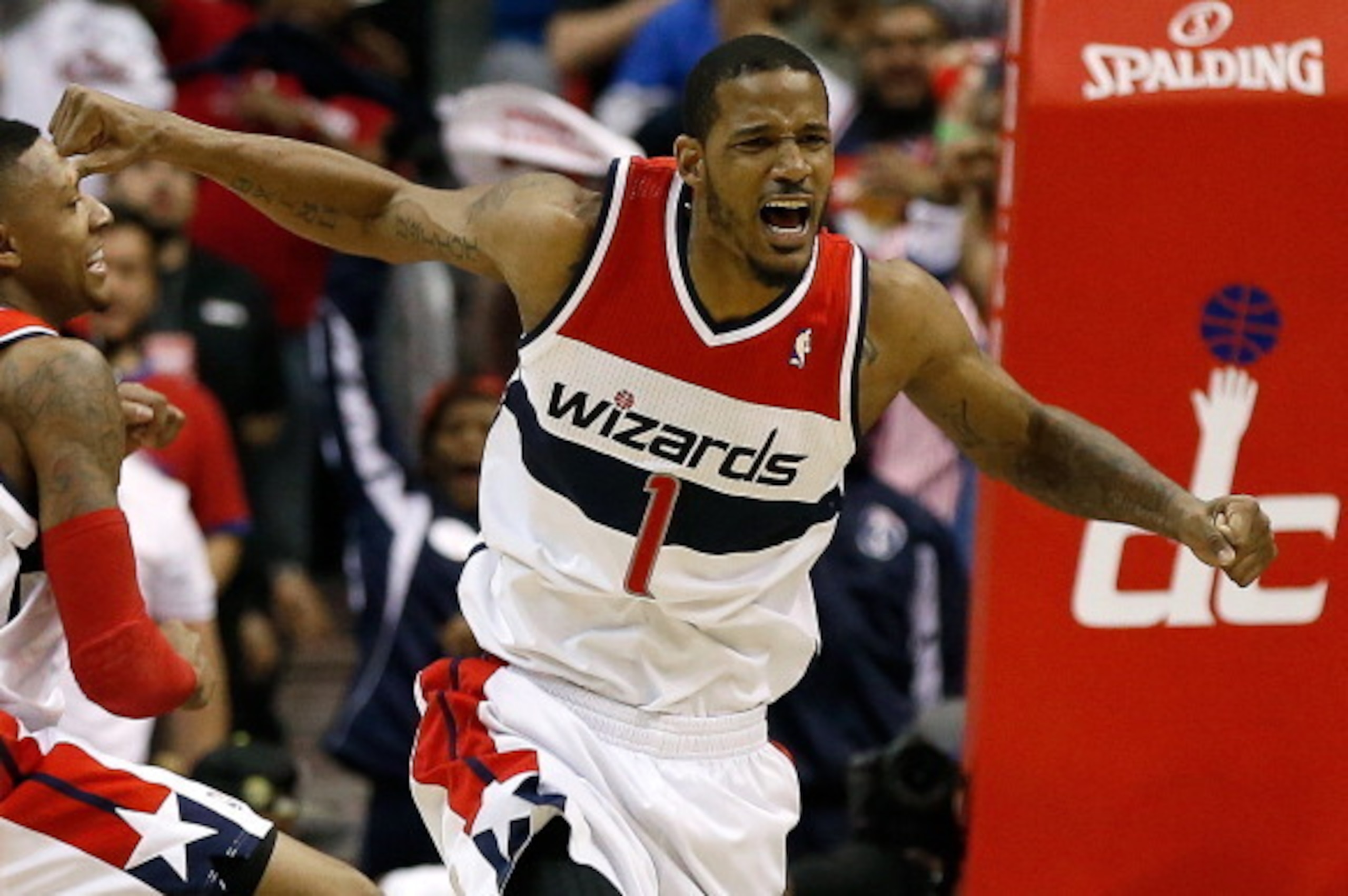 WASHINGTON, DC - APRIL 27:  Trevor Ariza #1 of the Washington Wizards celebrates after scoring a key basket late in the fourth quarter against the Chicago Bulls in Game Four of the Eastern Conference Quarterfinals during the 2014 NBA Playoffs at the Veriz