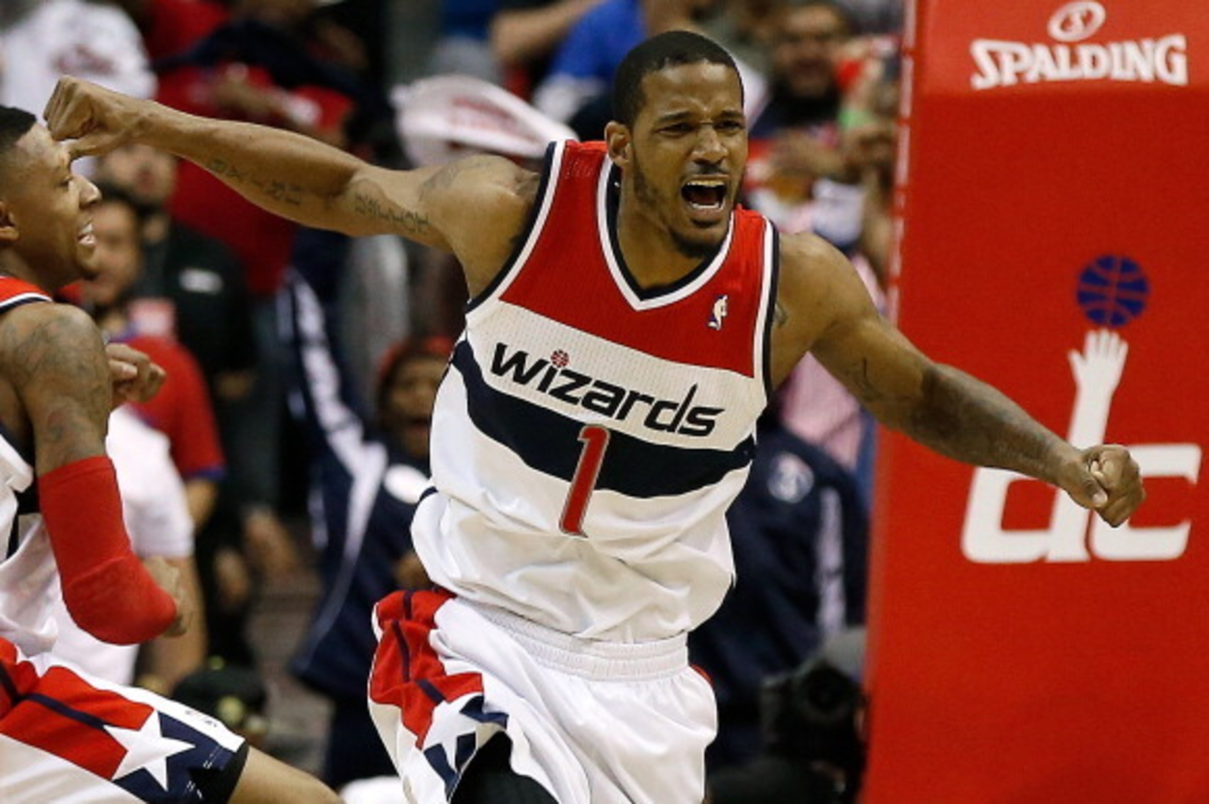 WASHINGTON, DC - APRIL 27:  Trevor Ariza #1 of the Washington Wizards celebrates after scoring a key basket late in the fourth quarter against the Chicago Bulls in Game Four of the Eastern Conference Quarterfinals during the 2014 NBA Playoffs at the Veriz
