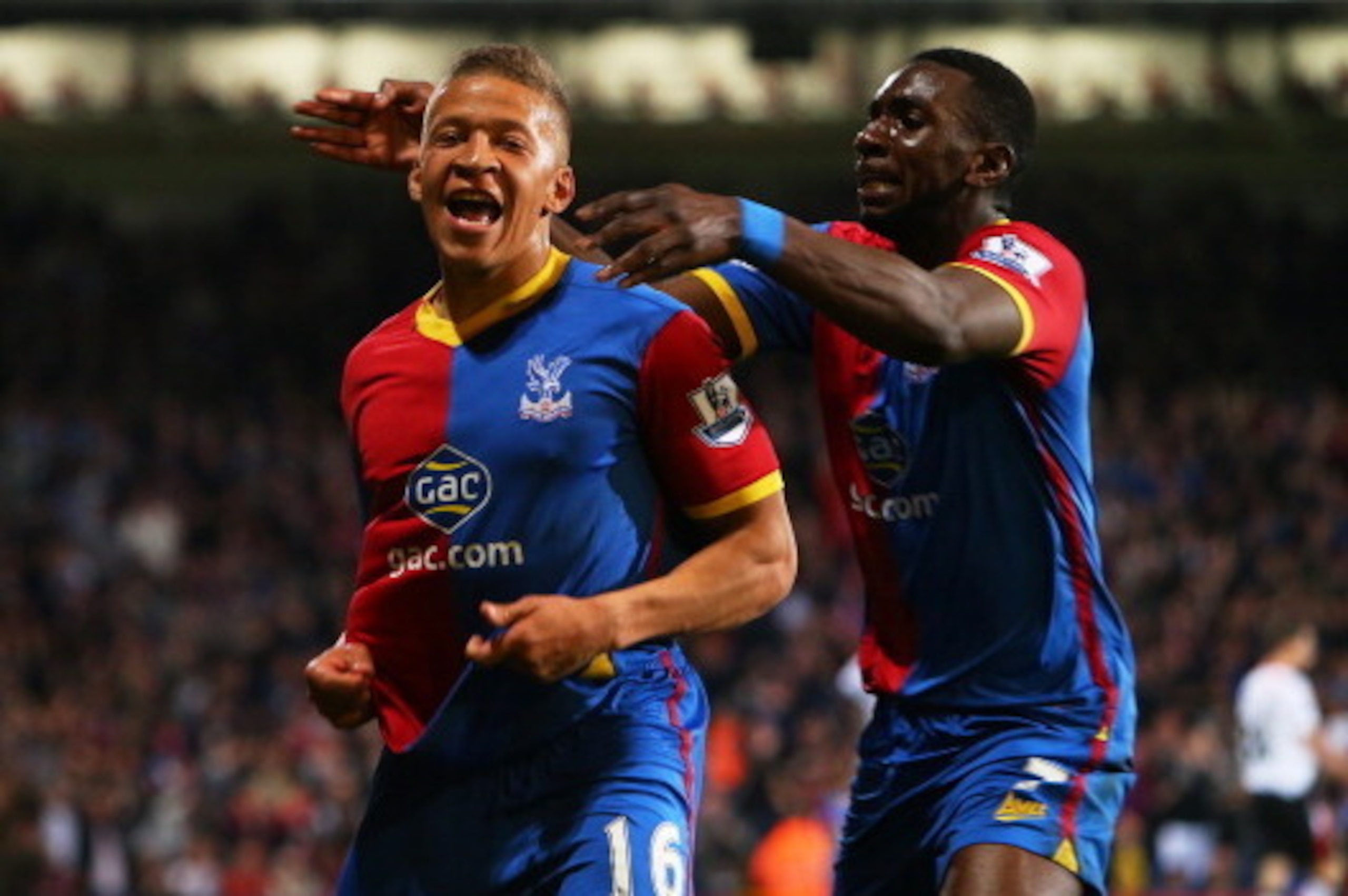 LONDON, ENGLAND - MAY 05:  Dwight Gayle #16 (L) of Crystal Palace celebrates with teammate Yannick Bolasie after scoring his team's third goal to level the scores at 3-3 during the Barclays Premier League match between Crystal Palace and Liverpool at Selh