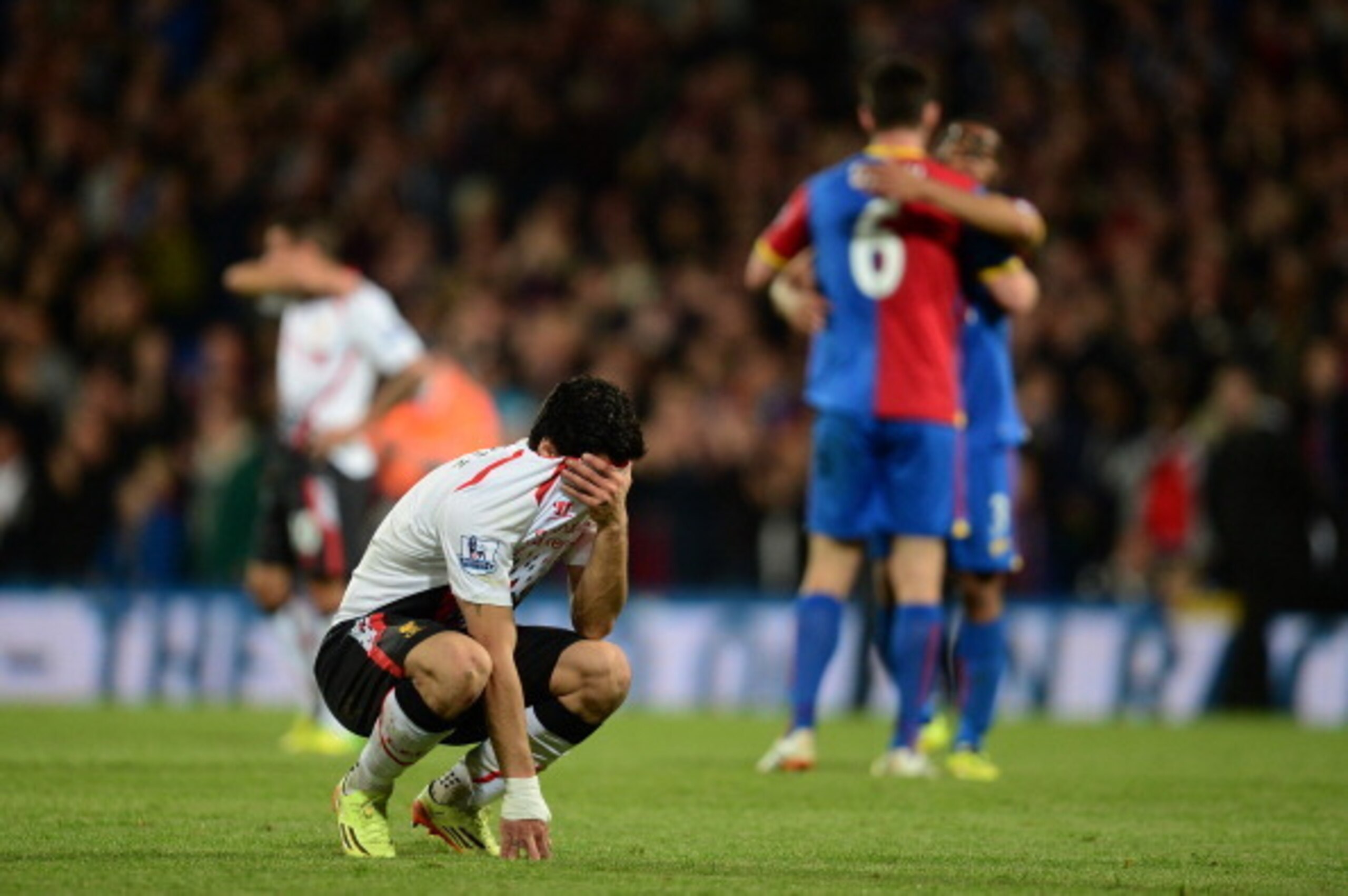 LONDON, ENGLAND - MAY 05:  A dejected Luis Suarez of Liverpool reacts following his team's 3-3 draw during the Barclays Premier League match between Crystal Palace and Liverpool at Selhurst Park on May 5, 2014 in London, England.  (Photo by Jamie McDonald