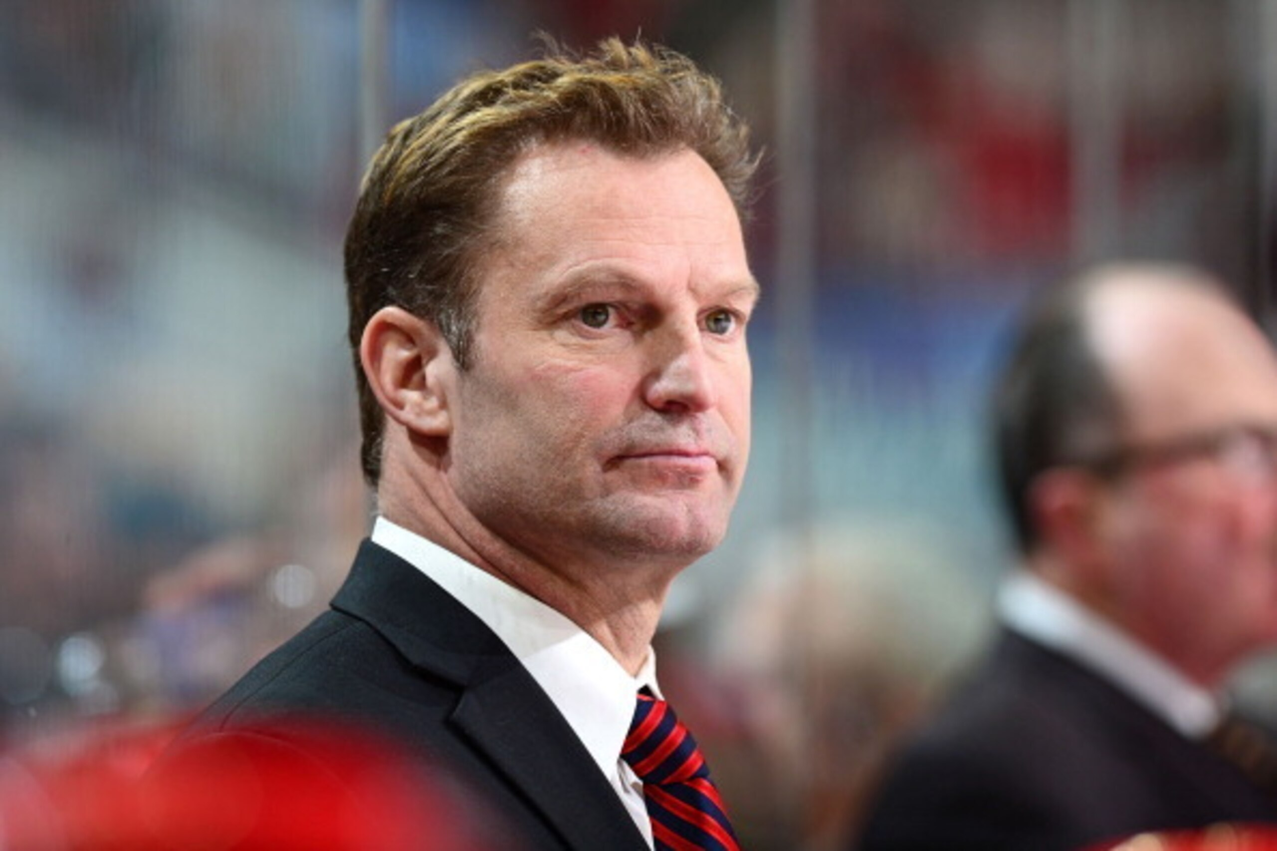 RALEIGH, NC - FEBRUARY 28: Kirk Muller of the Carolina Hurricanes looks out onto the ice during an NHL game against the Pittsburgh Penguins on February 28, 2013 at PNC Arena in Raleigh, North Carolina.  (Photo by Phil Ellsworth/NHLI via Getty Images)