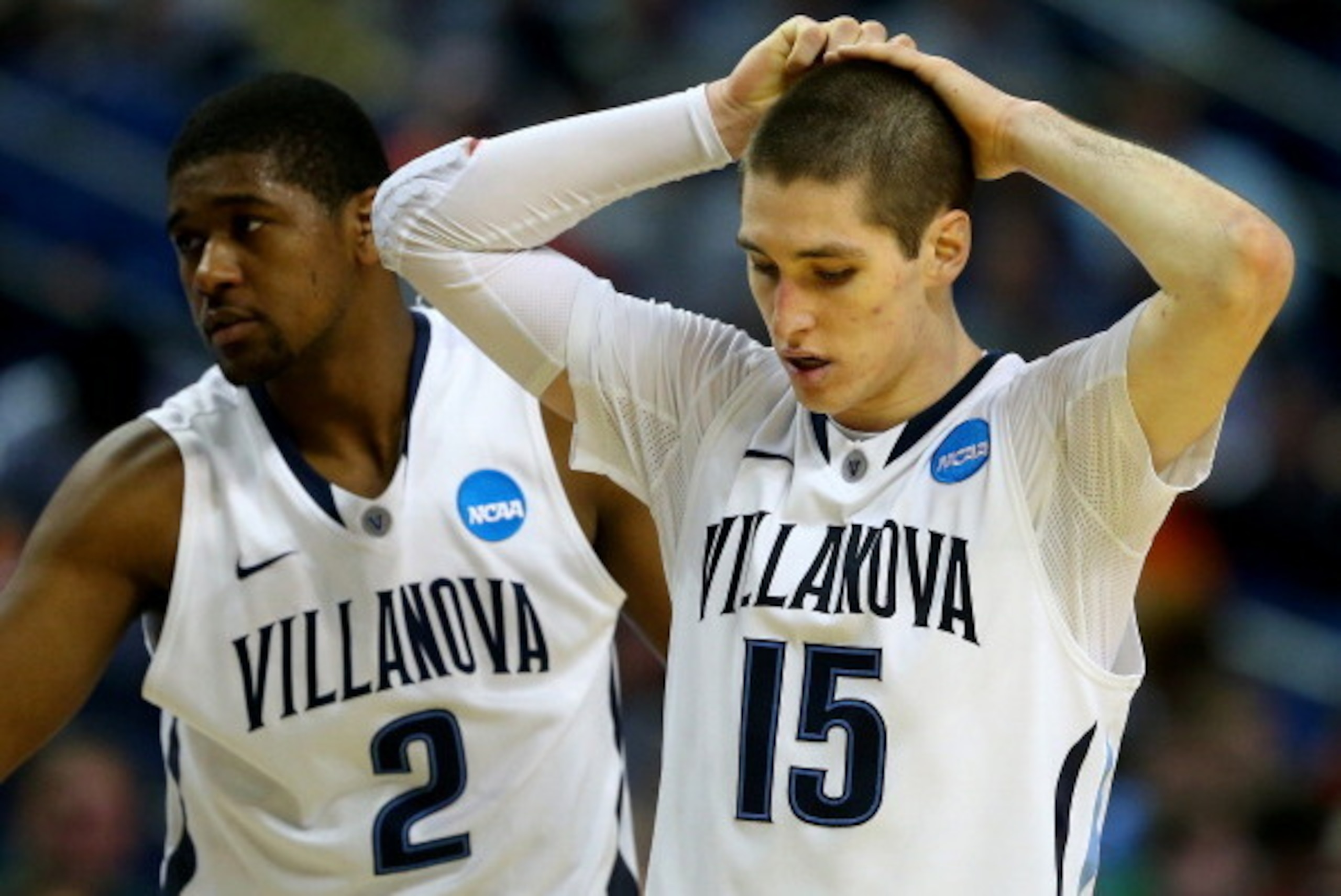 BUFFALO, NY - MARCH 22: Ryan Arcidiacono #15 of the Villanova Wildcats reacts against the Connecticut Huskies during the third round of the 2014 NCAA Men's Basketball Tournament at the First Niagara Center on March 22, 2014 in Buffalo, New York.  (Photo b