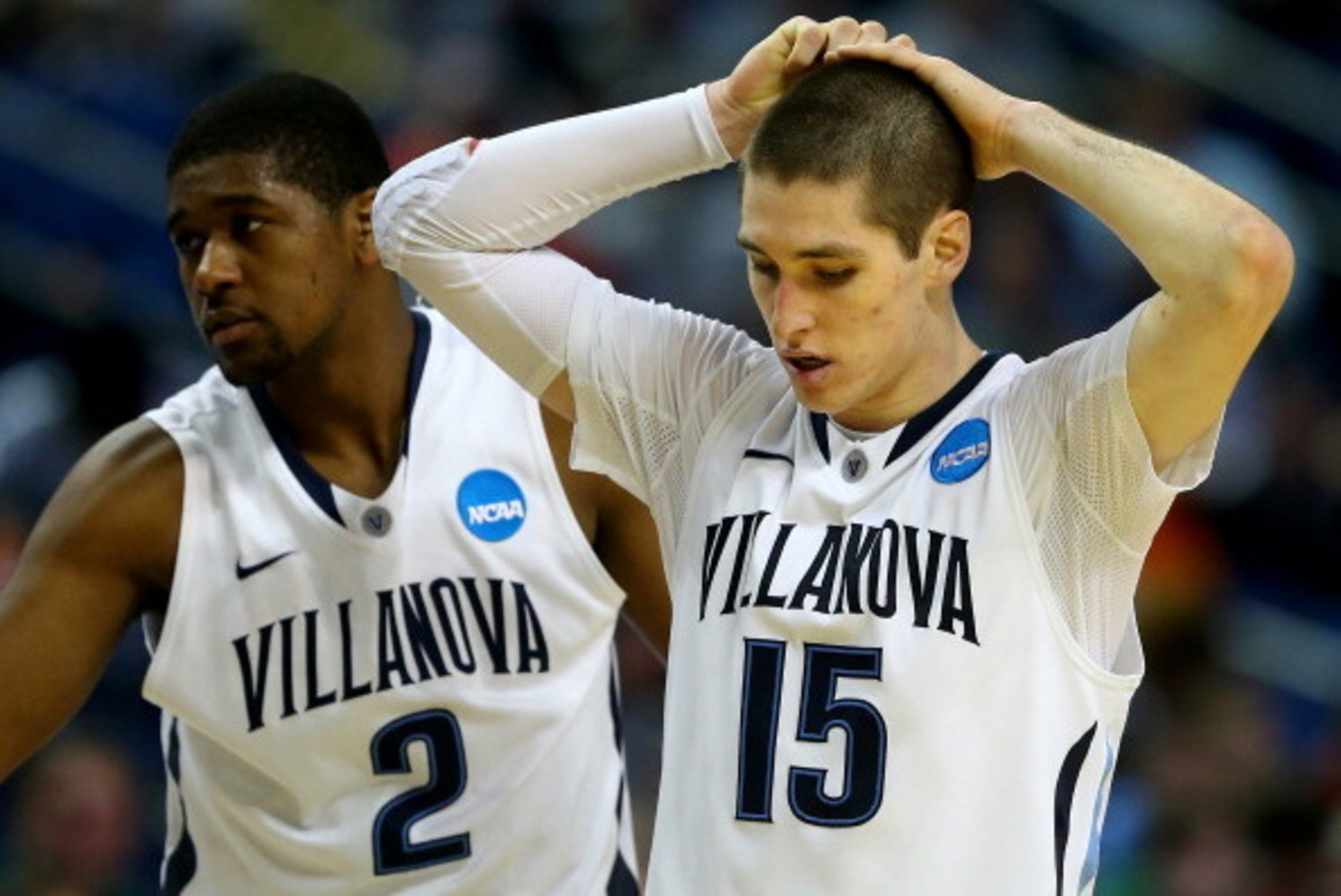 BUFFALO, NY - MARCH 22: Ryan Arcidiacono #15 of the Villanova Wildcats reacts against the Connecticut Huskies during the third round of the 2014 NCAA Men's Basketball Tournament at the First Niagara Center on March 22, 2014 in Buffalo, New York.  (Photo b