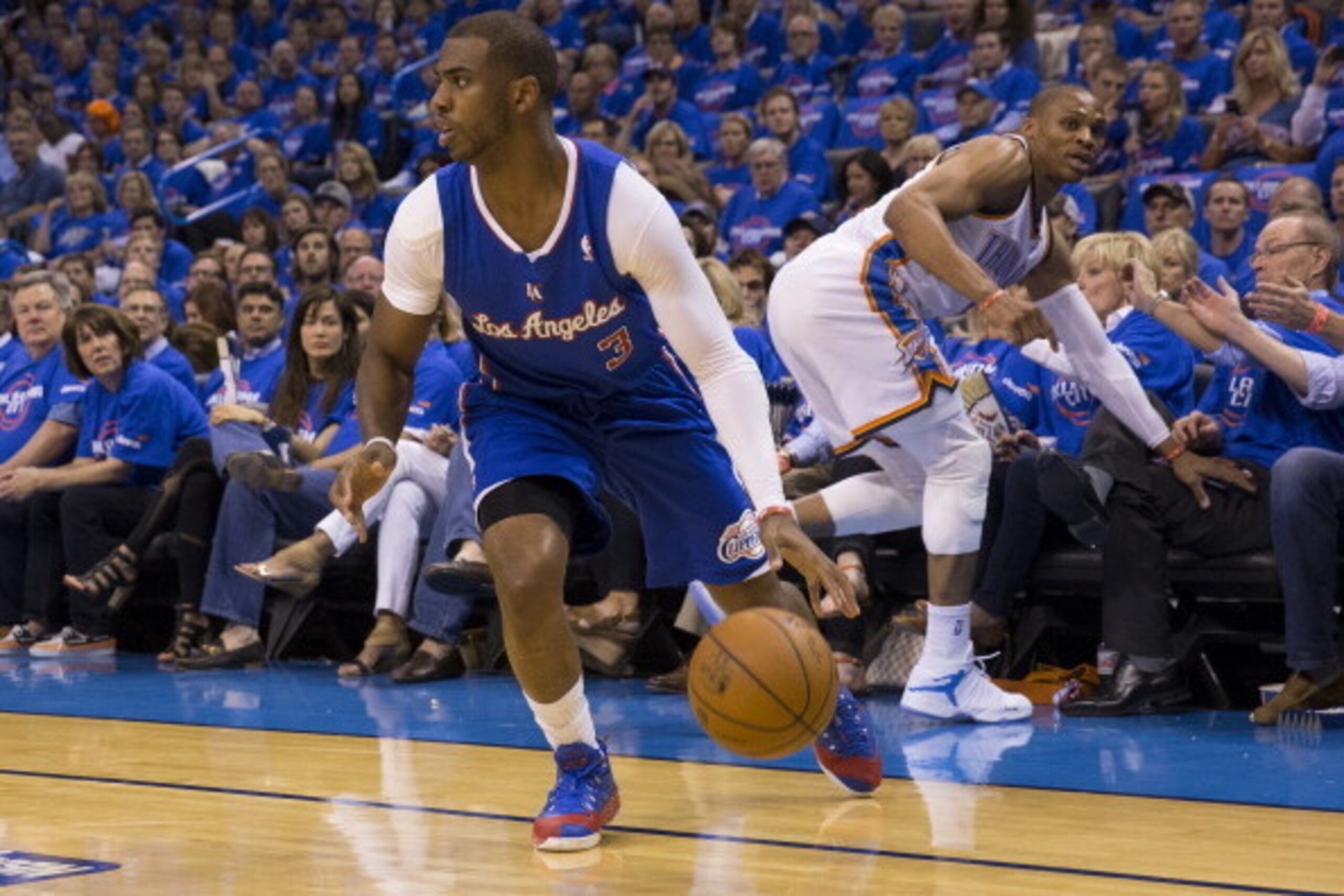 OKLAHOMA CITY, OK - MAY 5: Chris Paul #3 of the Los Angeles Clippers drives against the Oklahoma City Thunder in Game One of the Western Conference Semifinals during the 2014 NBA Playoffs at the Chesapeake Arena on May 5, 2014 in Oklahoma City, Oklahoma. 