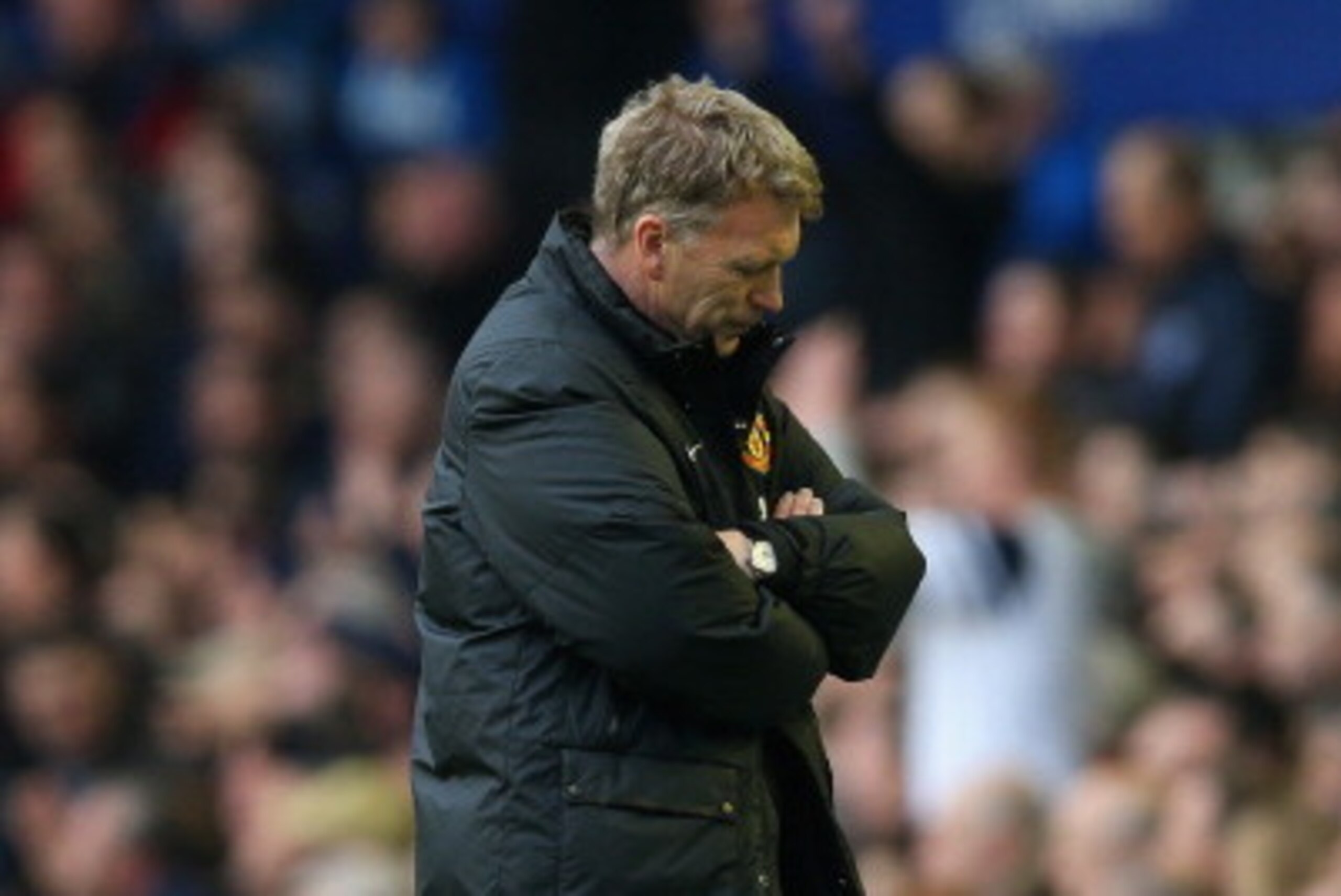 LIVERPOOL, ENGLAND - APRIL 20:  A dejected David Moyes manager of Manchester United looks to the ground during the Barclays Premier League match between Everton and Manchester United at Goodison Park on April 20, 2014 in Liverpool, England.  (Photo by Cli