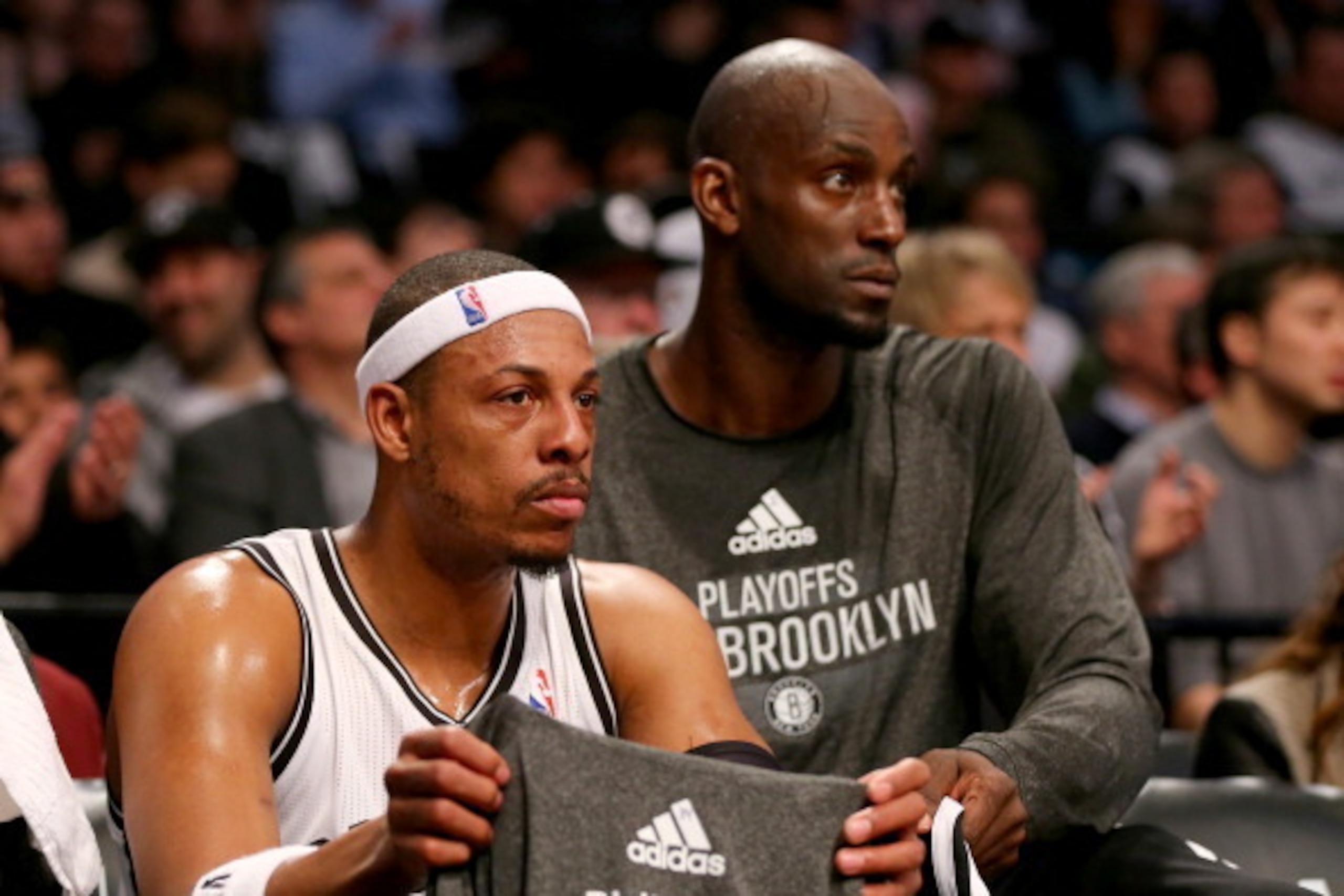 NEW YORK, NY - APRIL 25:  Paul Pierce #34 and Kevin Garnett #2 of the Brooklyn Nets look on from the bench in the first half against the Toronto Raptors in Game Three of the Eastern Conference Quarterfinals during the 2014 NBA Playoffs at the Barclays Cen