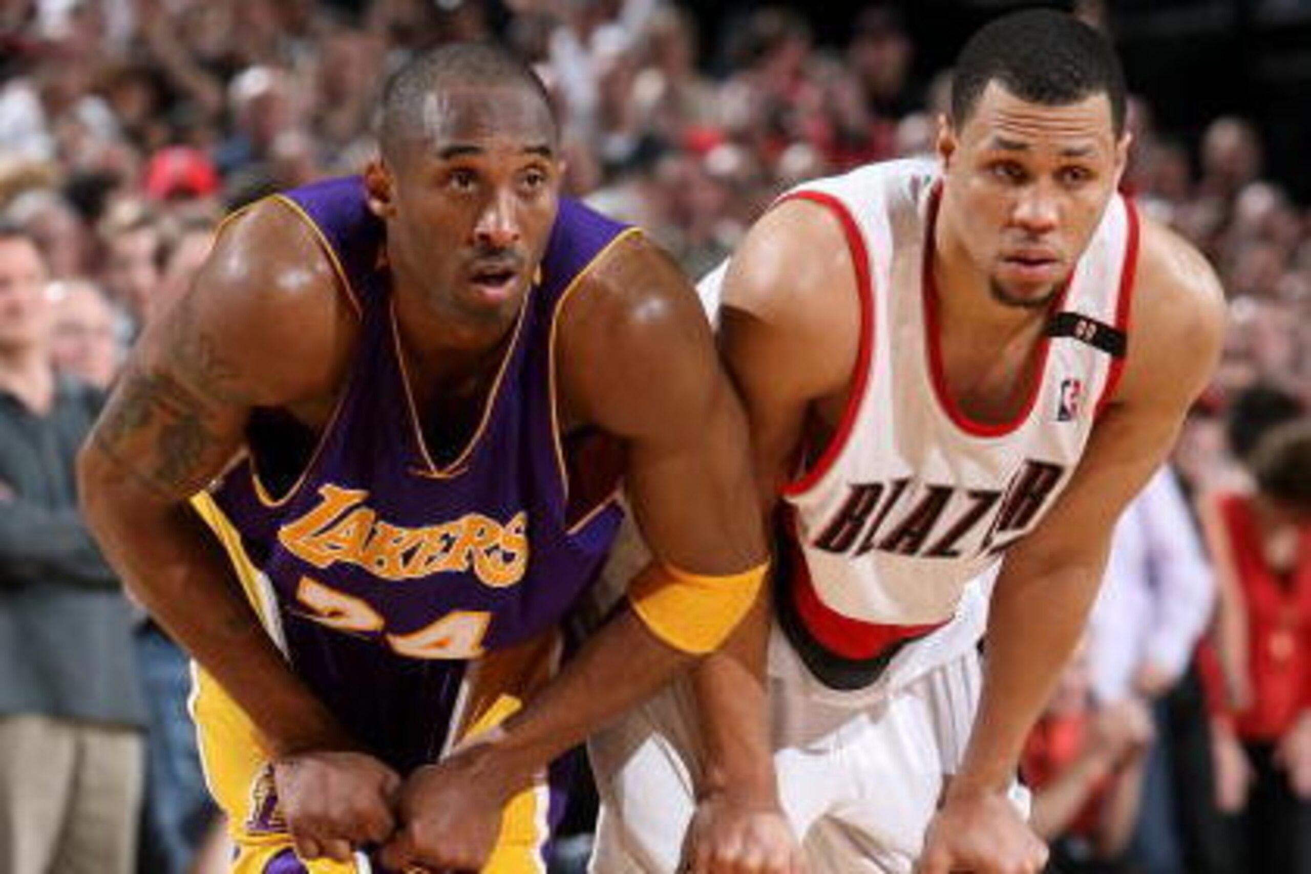 PORTLAND, OR - APRIL 10:  Kobe Bryant #24 of the Los Angeles Lakers and Brandon Roy #7 of the Portland Trail Blazers fights for position on the court during the game on April 10, 2009 at the Rose Garden in Portland, Oregon.  The Trail Blazers won 106-98.