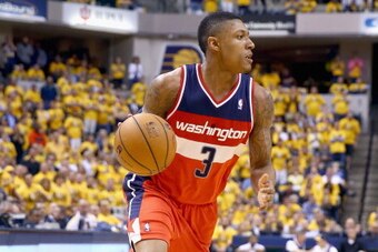 INDIANAPOLIS, IN - MAY 05:  Bradley Beal #3 of the Washington Wizards dribbles the ball against the Indiana Pacers  in Game 1 of the Eastern Conference Semifinals during the 2014 NBA Playoffs at Bankers Life Fieldhouse on May 5, 2014 in Indianapolis, Indi