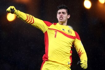 GLASGOW, SCOTLAND - SEPTEMBER 06:  Thibaut Courtois of Belgium celebrates after their second goal during the FIFA 2014 World Cup Qualifying Group A match between Scotland and Belgium at Hampden Park on September 6, 2013 in Glasgow, Scotland.  (Photo by Sc