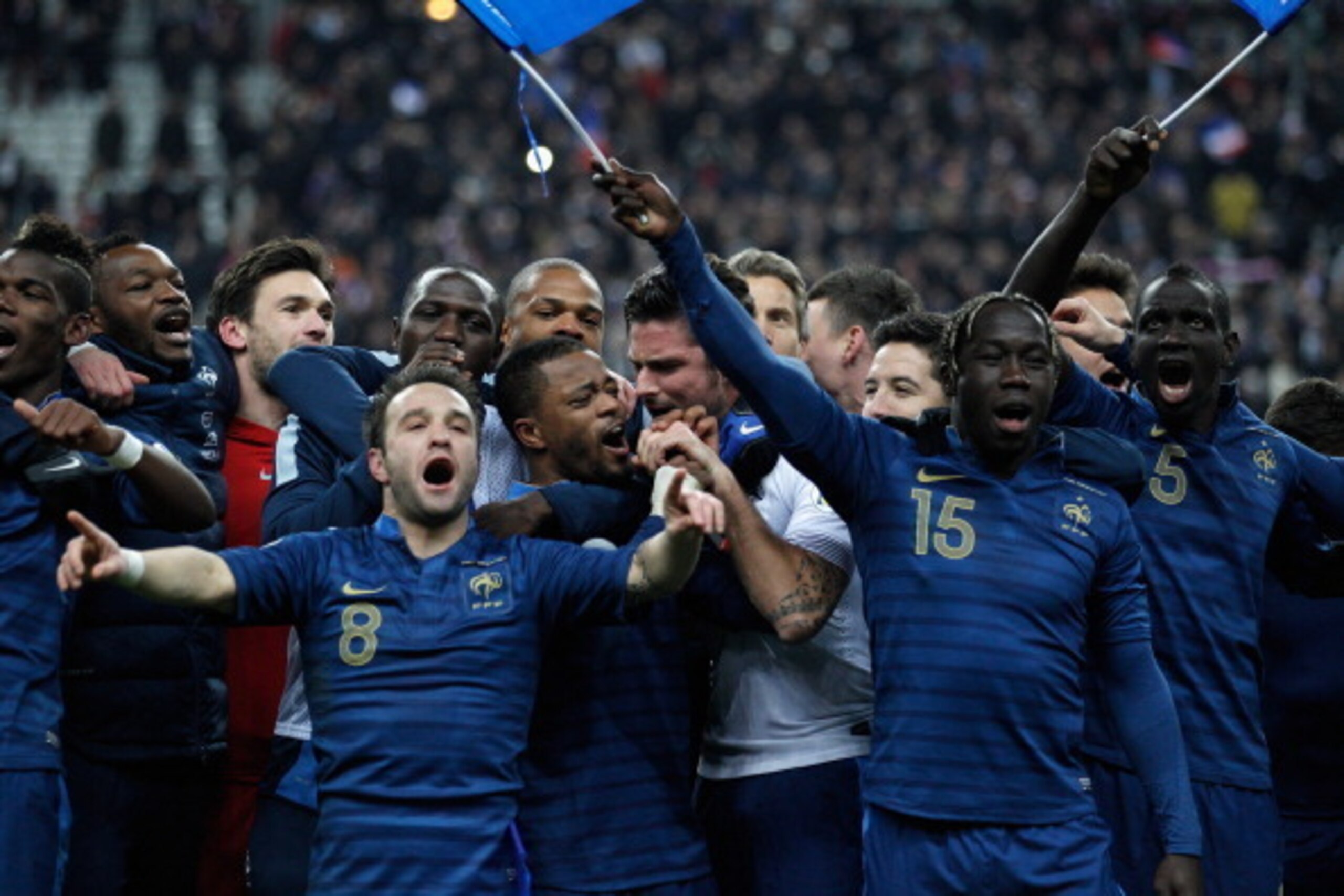 PARIS, FRANCE - NOVEMBER 19:  Members of the French team sing the Marseillaise after they won the FIFA 2014 World Cup Qualifier 2nd Leg Playoff between France and Ukraine at the Stade de France on November 19, 2013 in Paris, France.  (Photo by Harry Engel