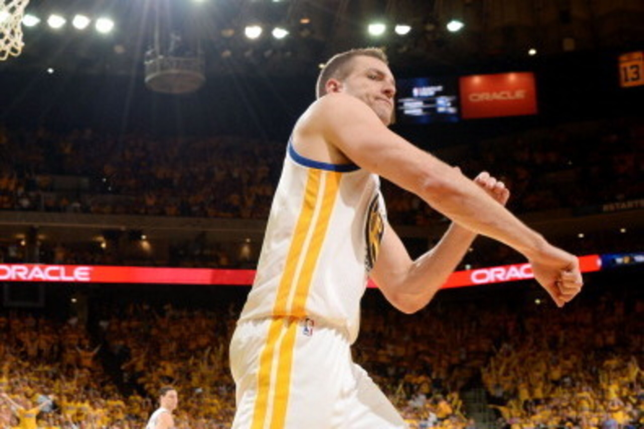 OAKLAND, CA - MAY 1: David Lee #10 of the Golden State Warriors celebrates during a game against the Los Angeles Clippers in Game Six of the Western Conference Quarterfinals during the NBA Playoffs at Oracle Arena on May 1, 2014 in Oakland, California. NO