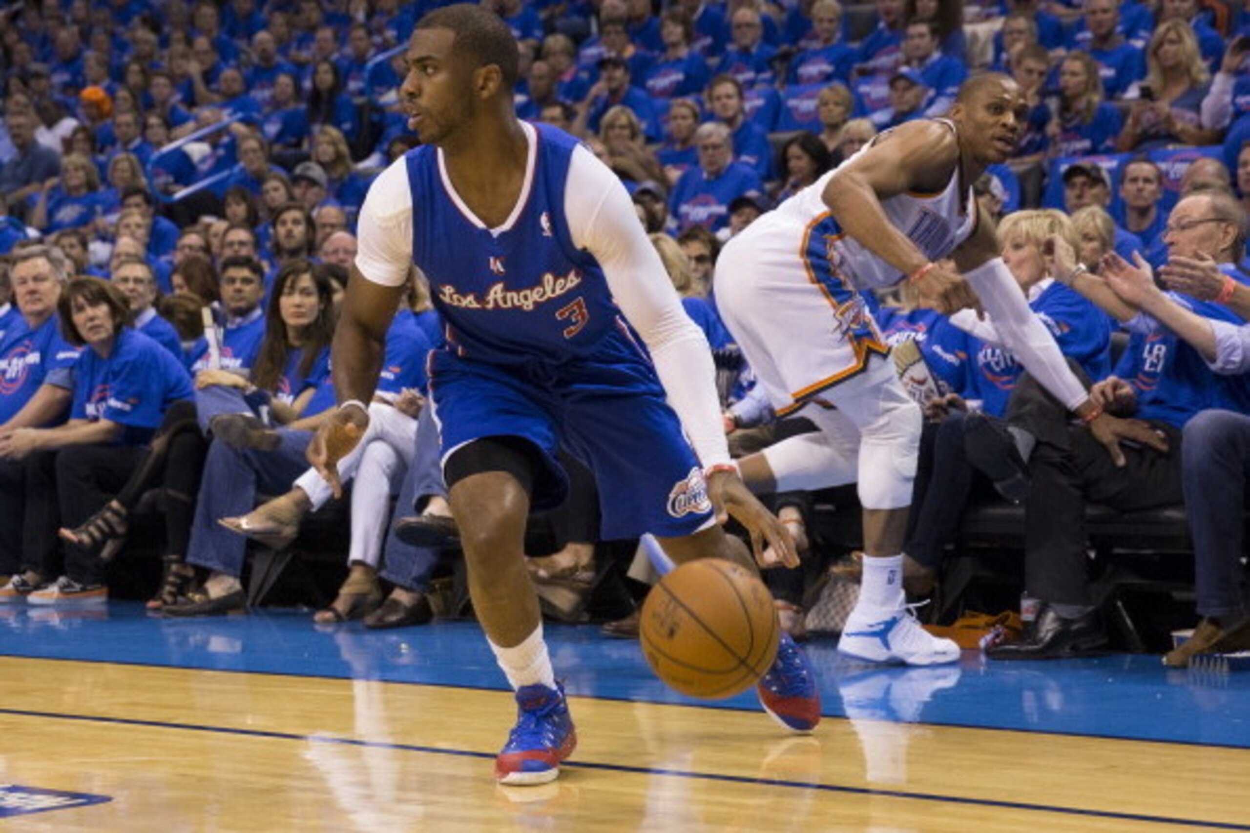 OKLAHOMA CITY, OK - MAY 5: Chris Paul #3 of the Los Angeles Clippers drives against the Oklahoma City Thunder in Game One of the Western Conference Semifinals during the 2014 NBA Playoffs at the Chesapeake Arena on May 5, 2014 in Oklahoma City, Oklahoma. 
