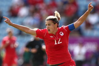 COVENTRY, ENGLAND - JULY 28:  Christine Sinclair of Canada celebrates scoring a goal during the Women's Football first round Group F Match of the London 2012 Olympic Games between Canada and South Africa, at City of Coventry Stadium on July 28, 2012 in Co