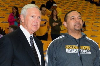 OAKLAND, CA - MAY 10: Executive Board member Jerry West and Head Coach Mark Jackson of the Golden State Warriors chat prior to the game against the San Antonio Spurs in Game Three of the Western Conference Semifinals during the 2013 NBA Playoffs on May 10