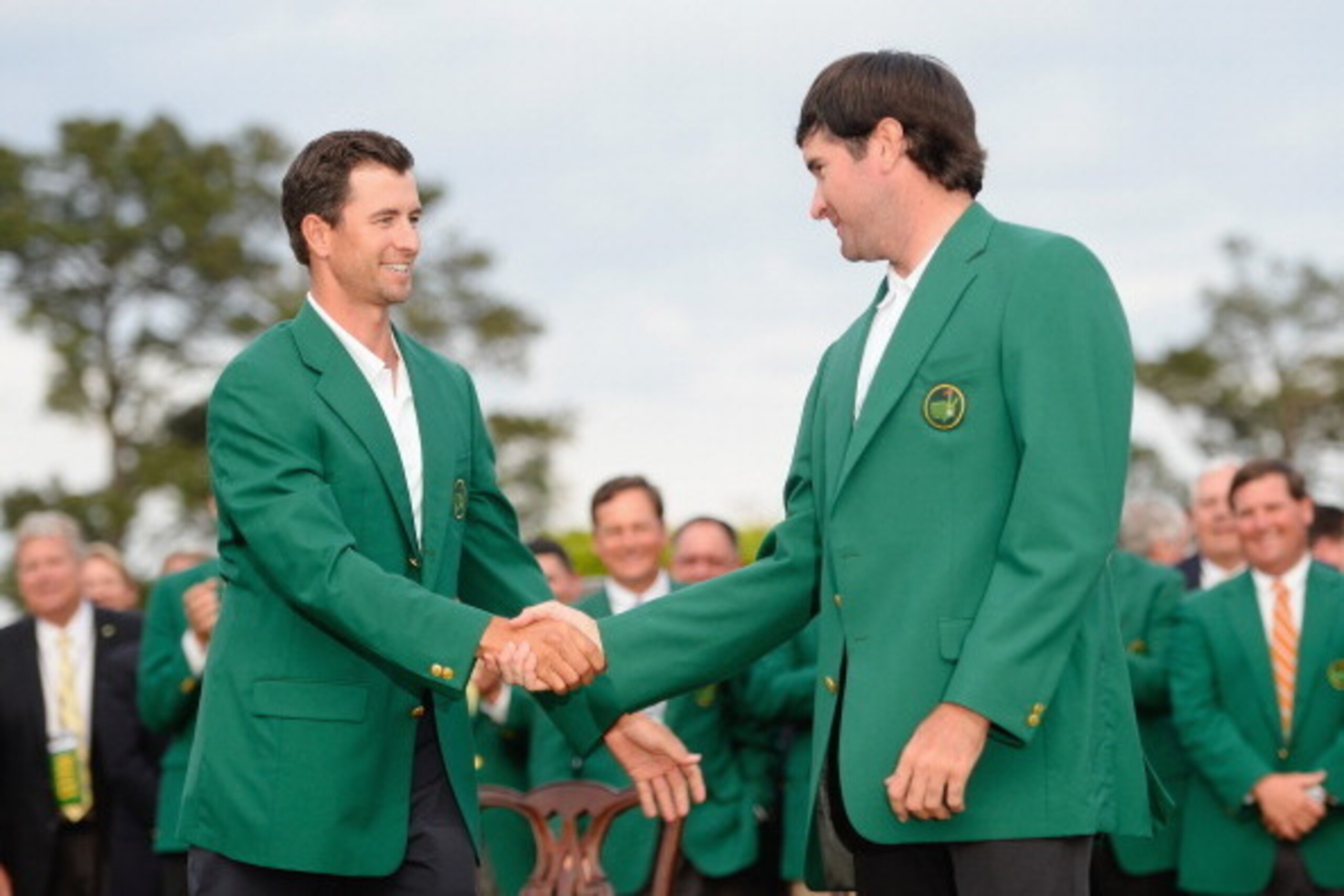 AUGUSTA, GA - APRIL 13:  Adam Scott of Australia shakes hands with Bubba Watson of the United States after Watson won the 2014 Masters Tournament by a three-stroke margin at Augusta National Golf Club on April 13, 2014 in Augusta, Georgia.  (Photo by Harr