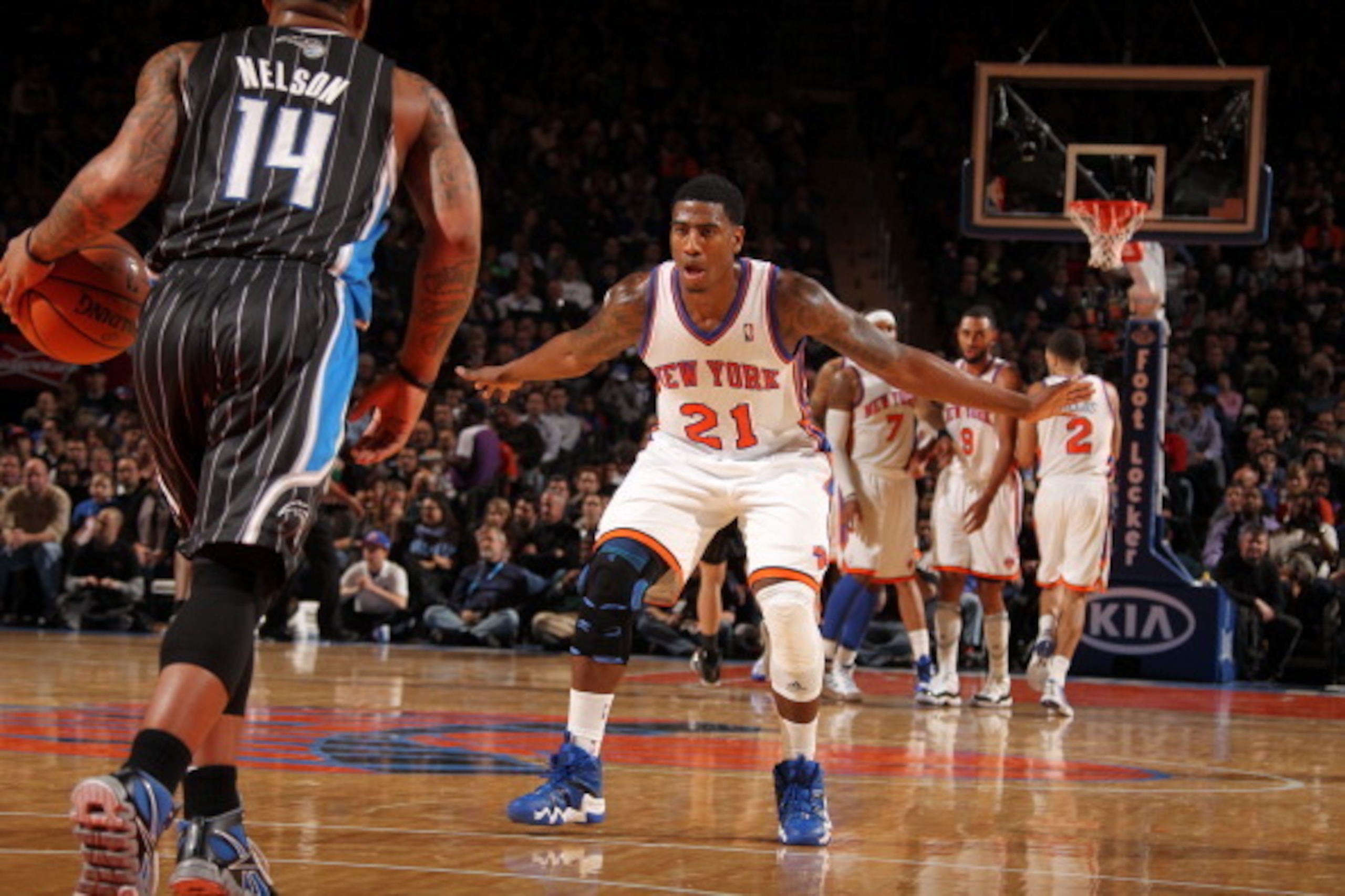 NEW YORK, NY - JANUARY 16: Iman Shumpert #21 of the New York Knicks looks to defend Jameer Nelson #14 of the Orlando Magic during the game on January 16, 2012 at Madison Square Garden in New York City.  NOTE TO USER: User expressly acknowledges and agrees