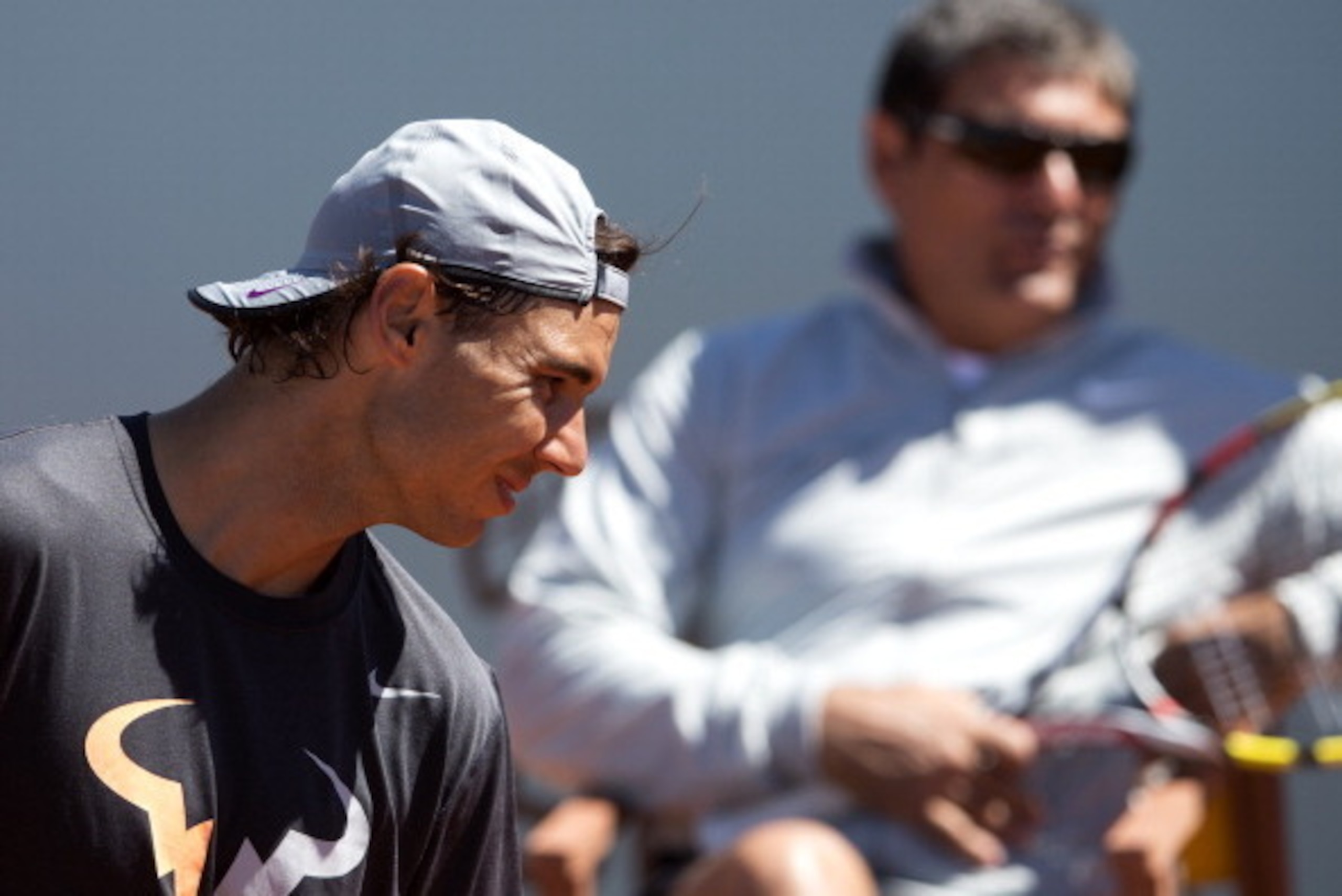MADRID, SPAIN - MAY 03:  Rafael Nadal of Spain with coach and uncle Toni together in a practice session during day one of the Mutua Madrid Open tennis tournament at the Caja Magica on May 3, 2014 in Madrid, Spain.  (Photo by Julian Finney/Getty Images)