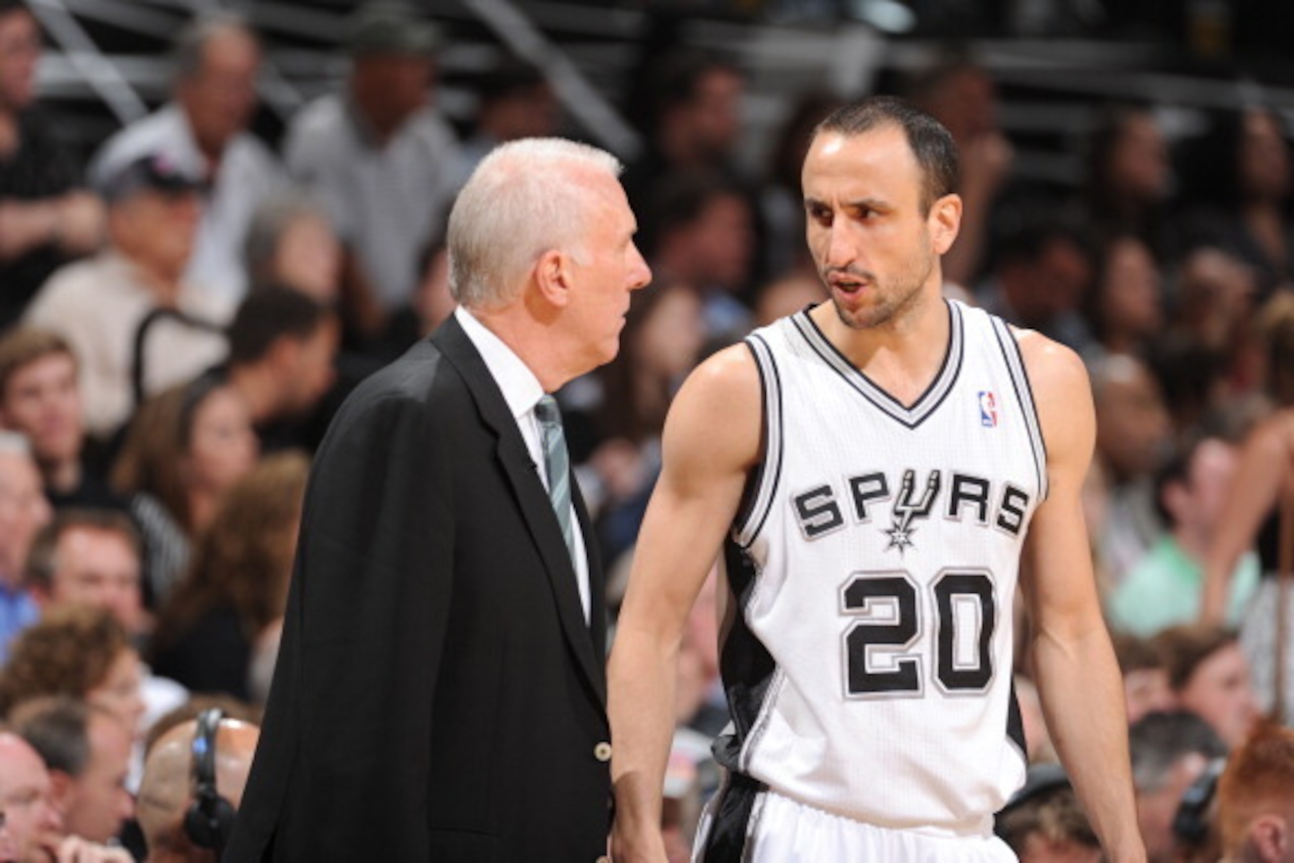 SAN ANTONIO, TX - MAY 6: Manu Ginobili #20 of the San Antonio Spurs talks with Head Coach Gregg Popovich in Game One of the Western Conference Semi-Finals against the Portland Trail Blazers during the 2014 NBA Playoffs at AT&T Center on May 6, 2014 in San