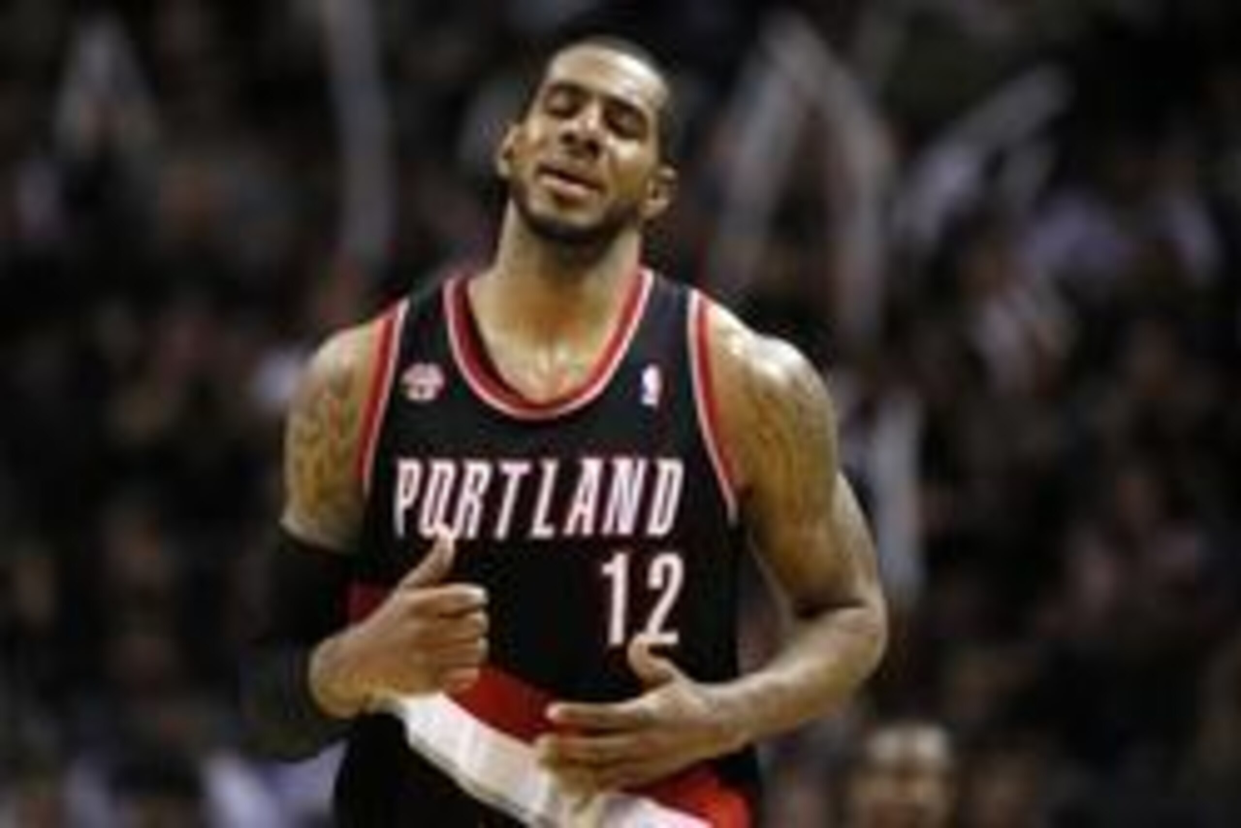 May 6, 2014; San Antonio, TX, USA; Portland Trail Blazers forward LaMarcus Aldridge (12) reacts against the San Antonio Spurs in game one of the second round of the 2014 NBA Playoffs at AT&T Center. Mandatory Credit: Soobum Im-USA TODAY Sports