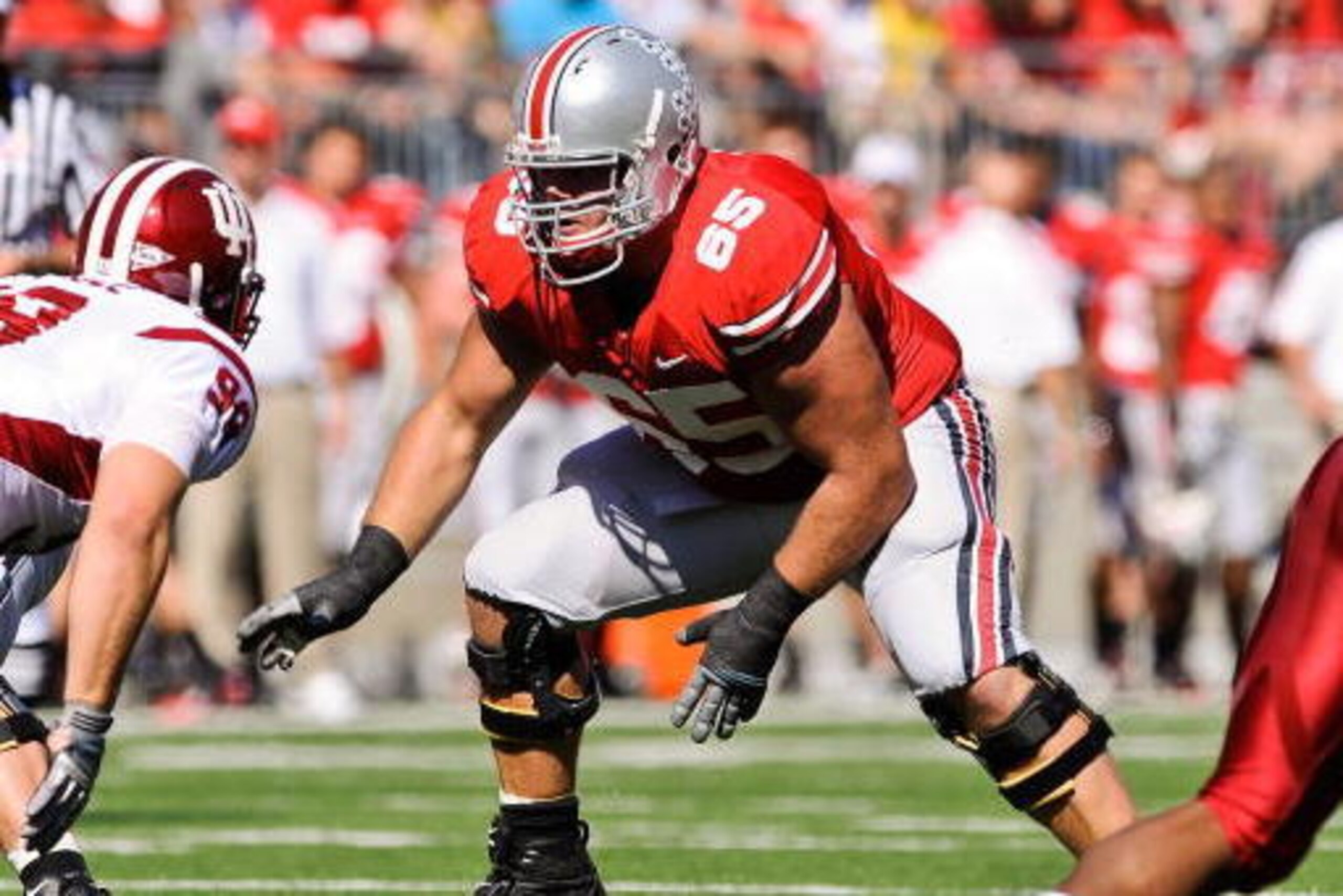 COLUMBUS, OH - OCTOBER 9:  Justin Boren #65 of the Ohio State Buckeyes blocks against the Indiana Hoosiers at Ohio Stadium on October 9, 2010 in Columbus, Ohio.  (Photo by Jamie Sabau/Getty Images)