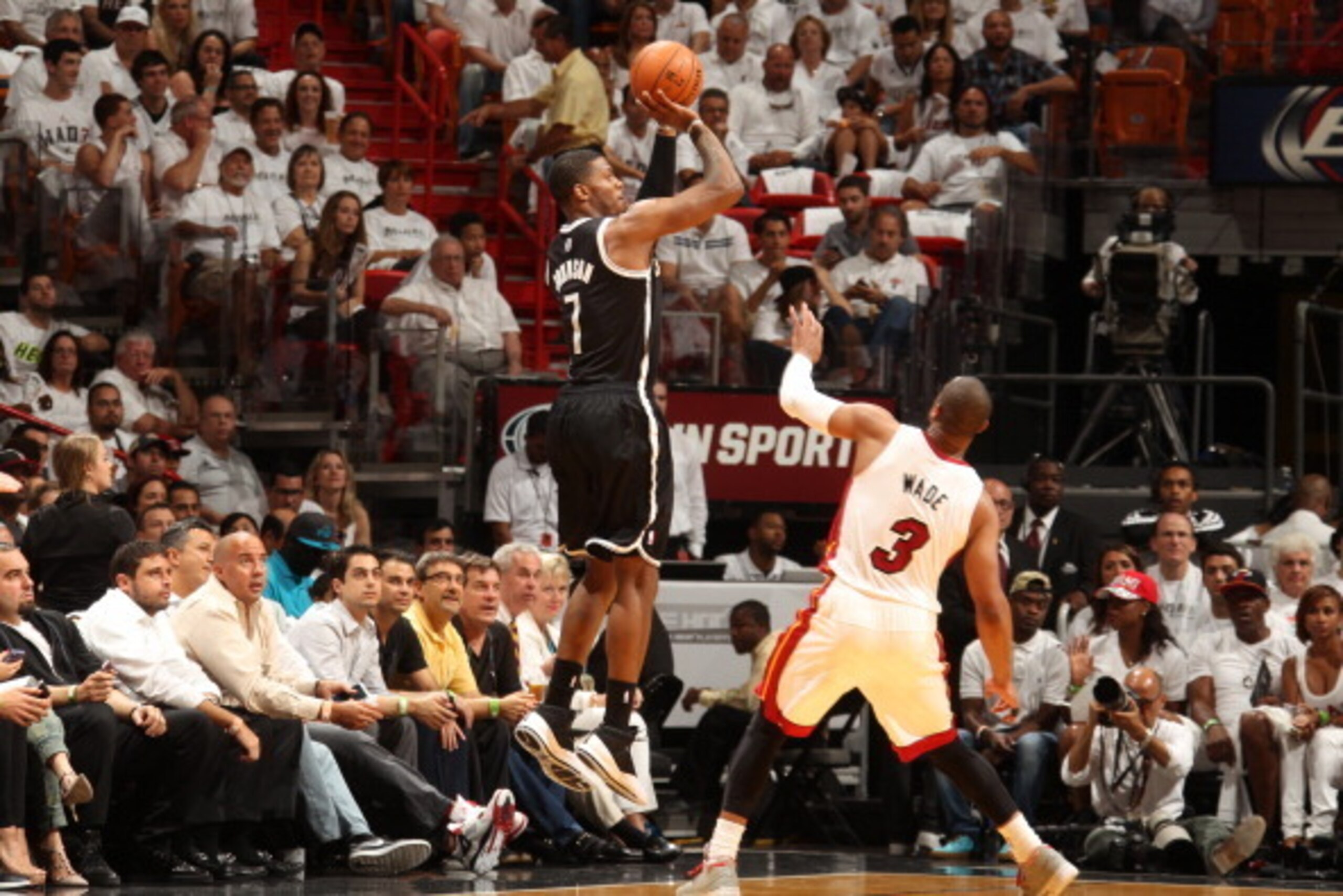 MIAMI, FL - MAY 6: Joe Johnson #7 of the Brooklyn Nets shoots against the Miami Heat in Game One of the Eastern Conference Semi-Finals during the 2014 NBA Playoffs at American Airlines Arena on May 6, 2014 in Miami, Florida. NOTE TO USER: User expressly a