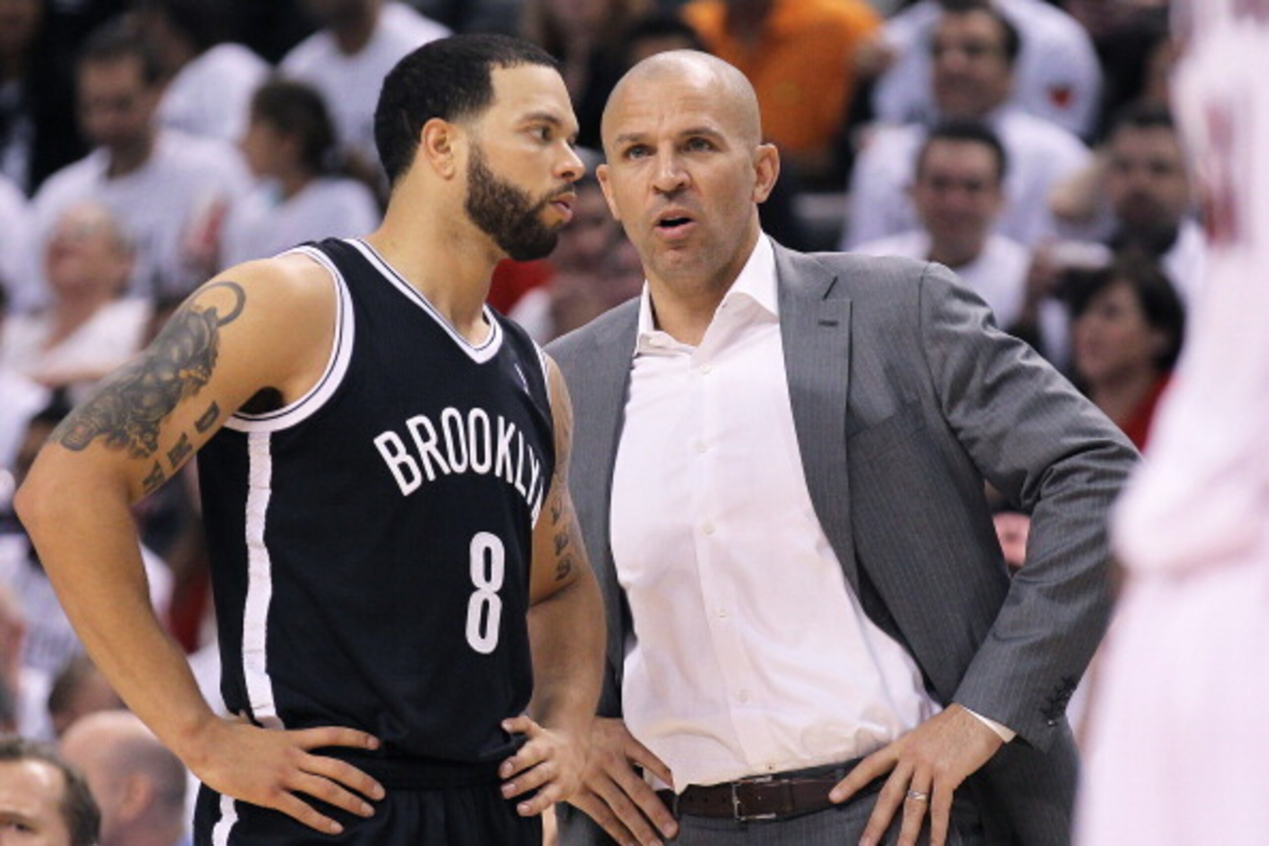 TORONTO, ON - MAY 4:  Head coach Jason Kidd of the Brooklyn Nets chats with Deron Williams #8 during a timeout against the Toronto Raptors in Game Seven of the NBA Eastern Conference Quarterfinals at the Air Canada Centre on May 4, 2014 in Toronto, Ontari