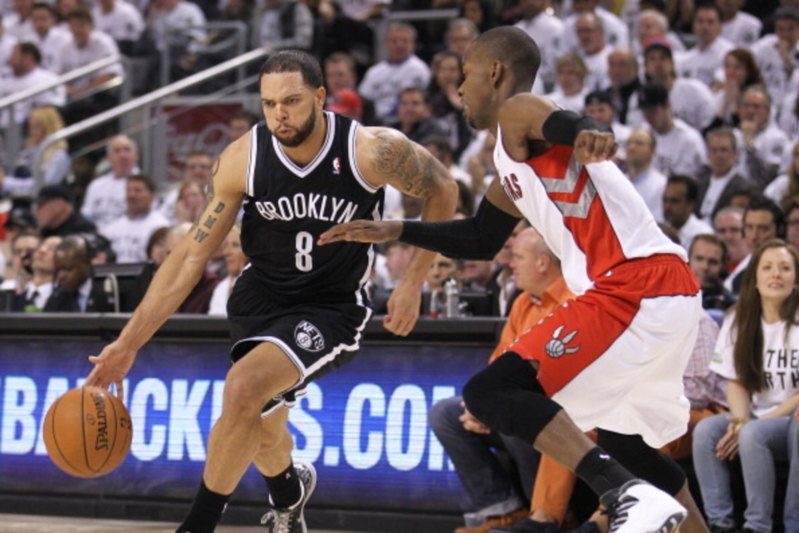 TORONTO, ON - APRIL 30:  Deron Williams #8 of the Brooklyn Nets plays against Terrence Ross #31 of the Toronto Raptors in Game Five of the NBA Eastern Conference Quarterfinals at the Air Canada Centre on April 30, 2014 in Toronto, Ontario, Canada. NOTE TO
