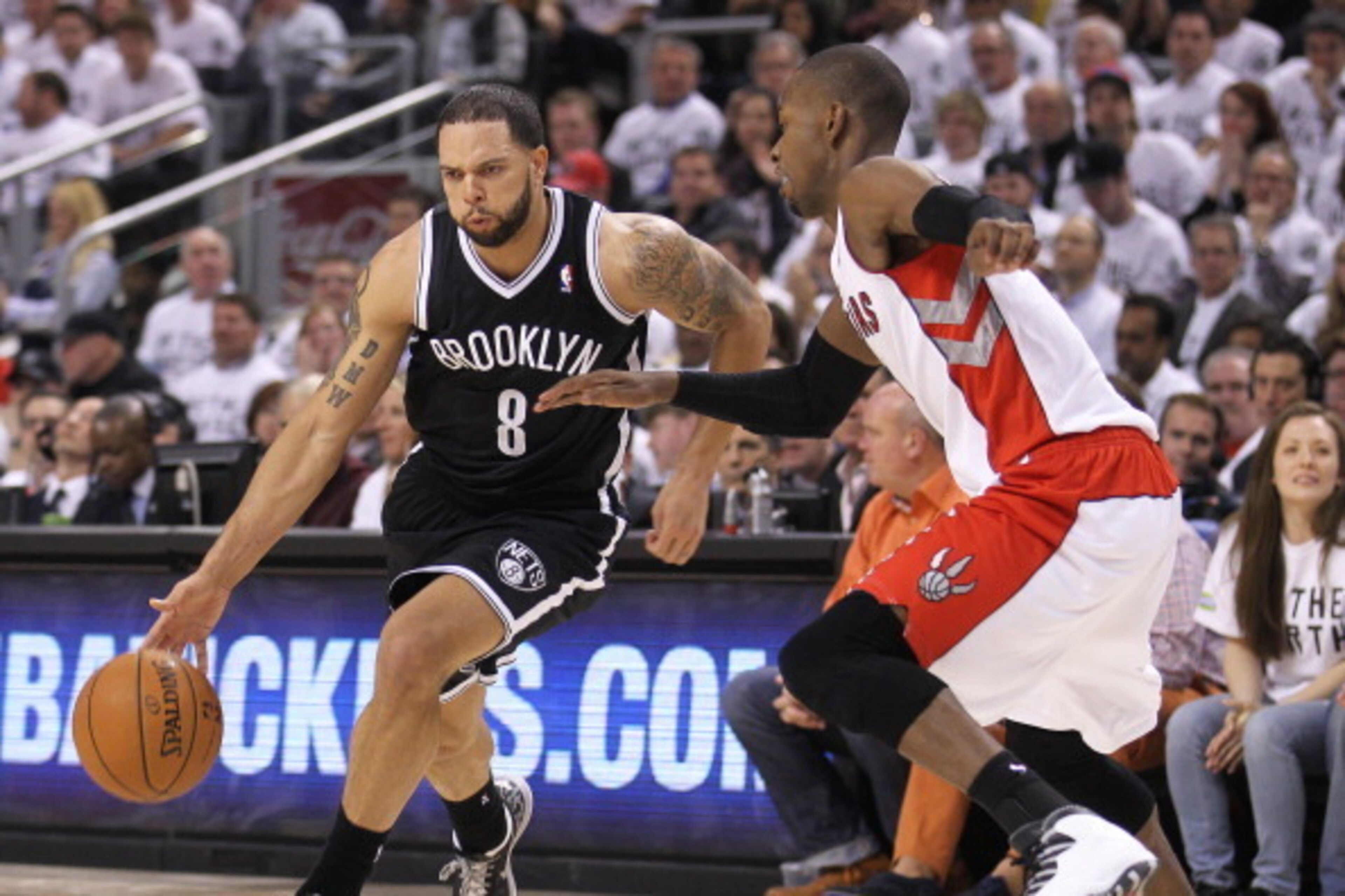TORONTO, ON - APRIL 30: Deron Williams #8 of the Brooklyn Nets plays against Terrence Ross #31 of the Toronto Raptors in Game Five of the NBA Eastern Conference Quarterfinals at the Air Canada Centre on April 30, 2014 in Toronto, Ontario, Canada. NOTE TO TORONTO, ON - APRIL 30: Deron Williams #8 of the Brooklyn Nets plays against Terrence Ross #31 of the Toronto Raptors in Game Five of the NBA Eastern Conference Quarterfinals at the Air Canada Centre on April 30, 2014 in Toronto, Ontario, Canada. NOTE TO