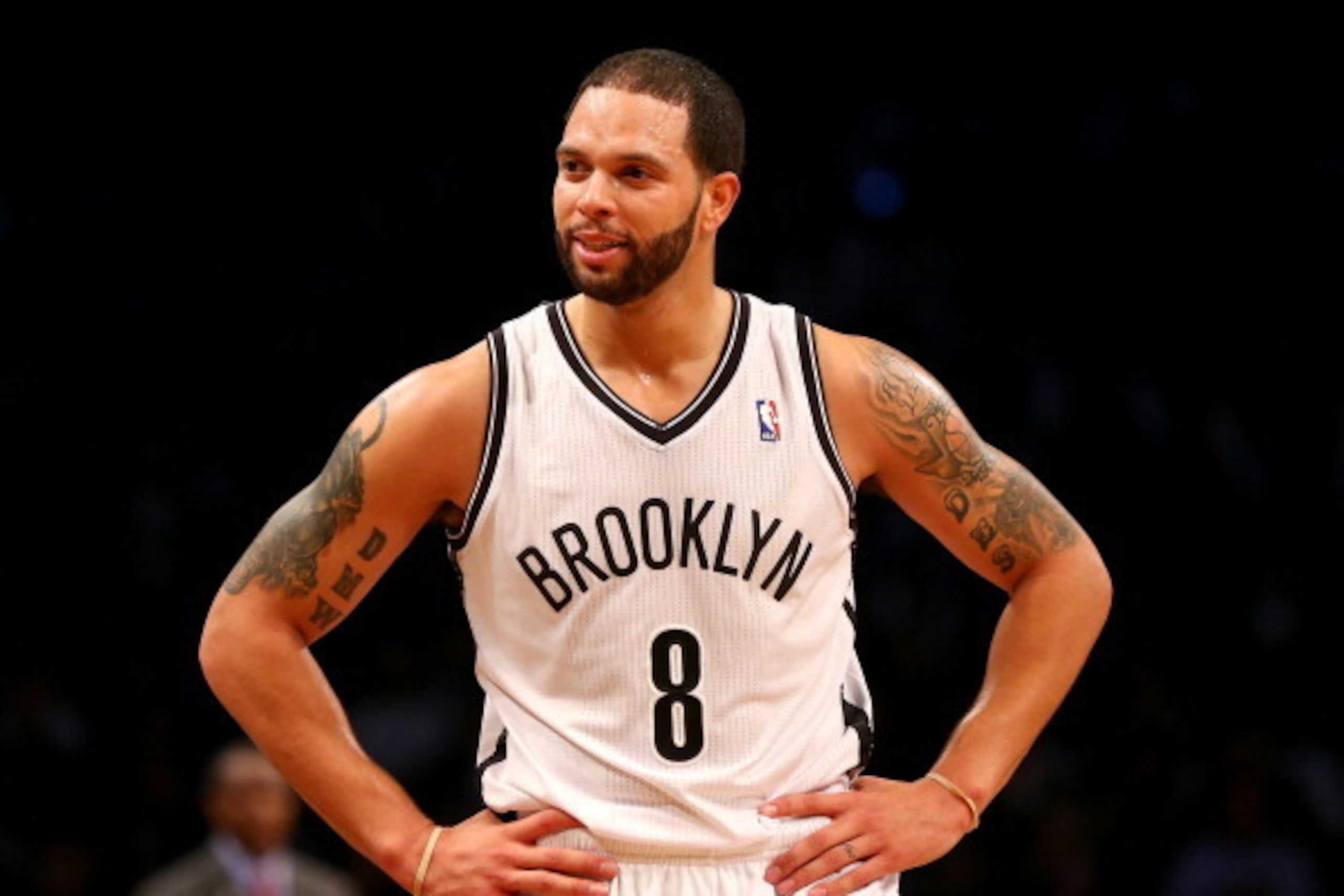 NEW YORK, NY - APRIL 25:  Deron Williams #8 of the Brooklyn Nets reacts in the second half against the Toronto Raptors in Game Three of the Eastern Conference Quarterfinals during the 2014 NBA Playoffs at the Barclays Center on April 25, 2014 in the Brook