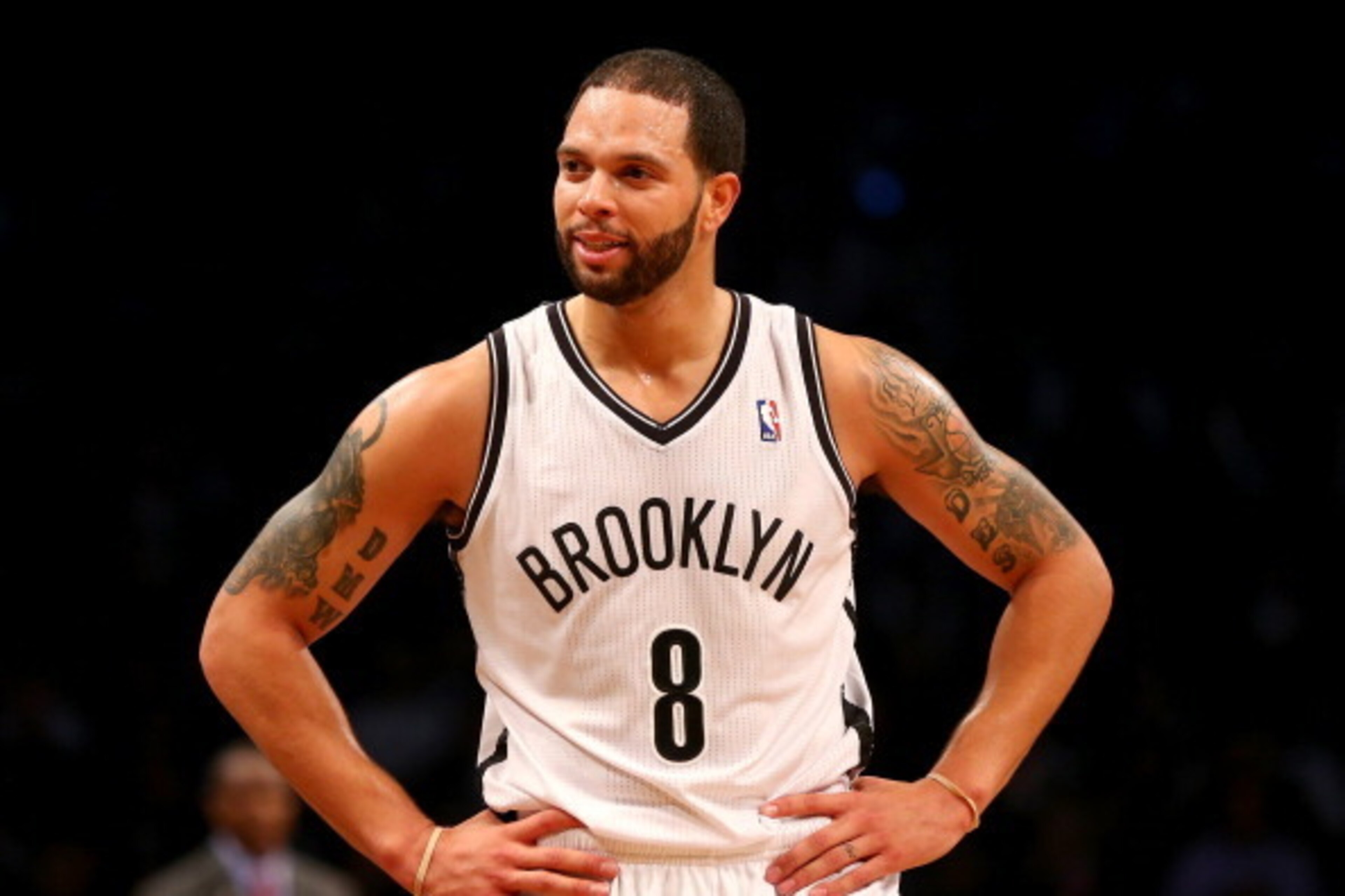 NEW YORK, NY - APRIL 25: Deron Williams #8 of the Brooklyn Nets reacts in the second half against the Toronto Raptors in Game Three of the Eastern Conference Quarterfinals during the 2014 NBA Playoffs at the Barclays Center on April 25, 2014 in the Brook NEW YORK, NY - APRIL 25: Deron Williams #8 of the Brooklyn Nets reacts in the second half against the Toronto Raptors in Game Three of the Eastern Conference Quarterfinals during the 2014 NBA Playoffs at the Barclays Center on April 25, 2014 in the Brook