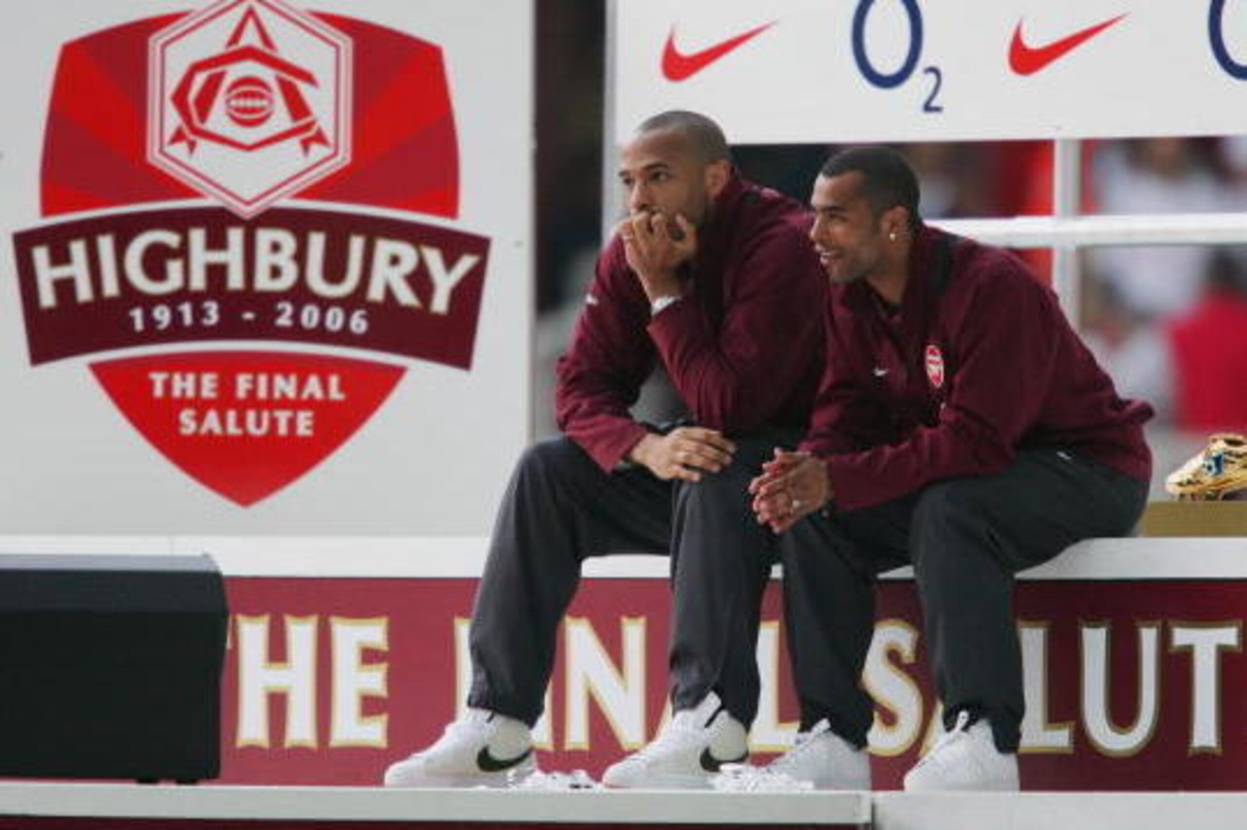 LONDON - MAY 07:  (L-R) Thierry Henry and Ashley Cole of Arsenal share a quiet moment after the Barclays Premiership match between Arsenal and Wigan Athletic at Highbury on May 7, 2006 in London, England.  The match was the last to be played at Highbury a