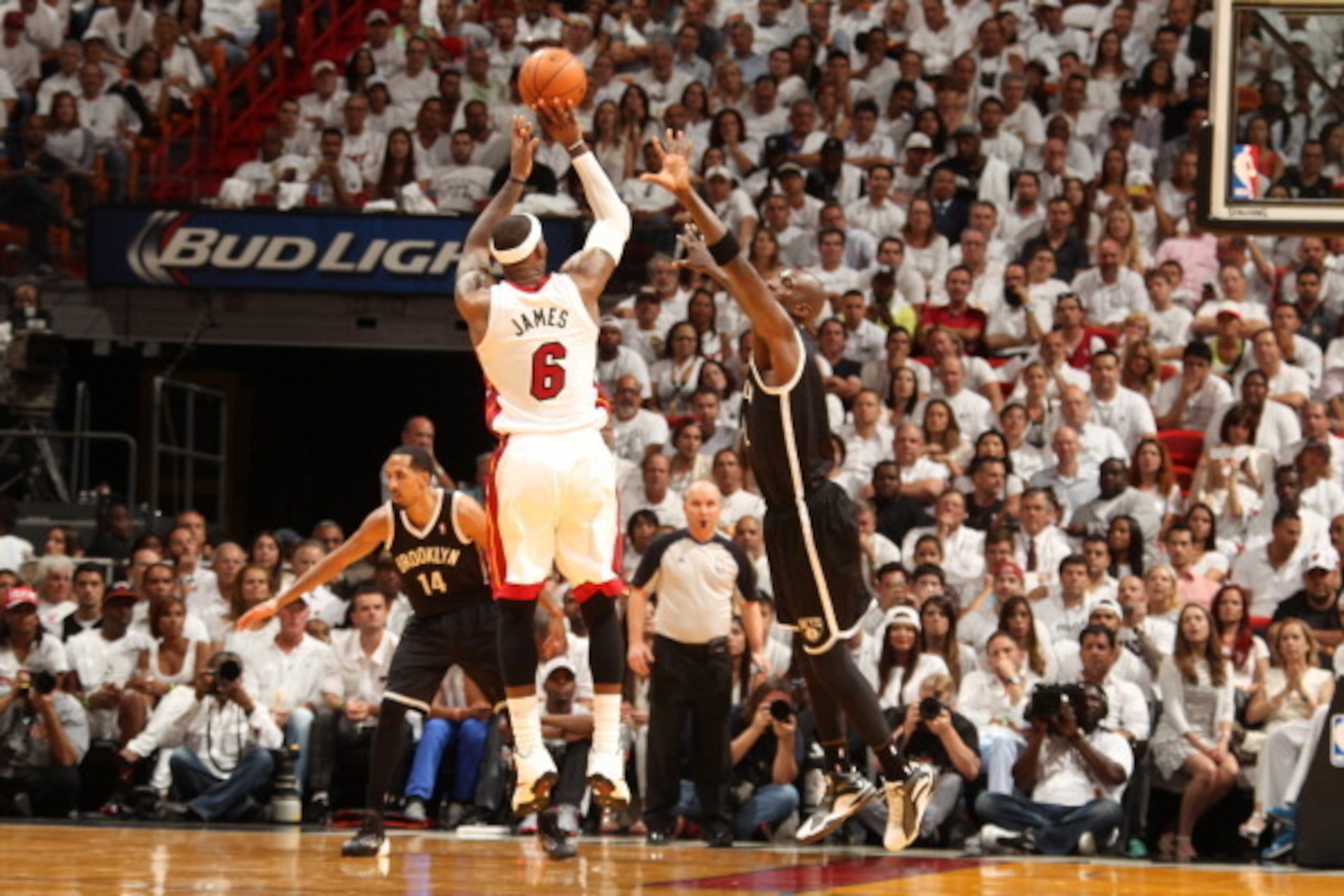 MIAMI, FL - MAY 6: LeBron James #6 of the Miami Heat shoots against the Brooklyn Nets in Game One of the Eastern Conference Semi-Finals during the 2014 NBA Playoffs at American Airlines Arena on May 6, 2014 in Miami, Florida. NOTE TO USER: User expressly MIAMI, FL - MAY 6: LeBron James #6 of the Miami Heat shoots against the Brooklyn Nets in Game One of the Eastern Conference Semi-Finals during the 2014 NBA Playoffs at American Airlines Arena on May 6, 2014 in Miami, Florida. NOTE TO USER: User expressly