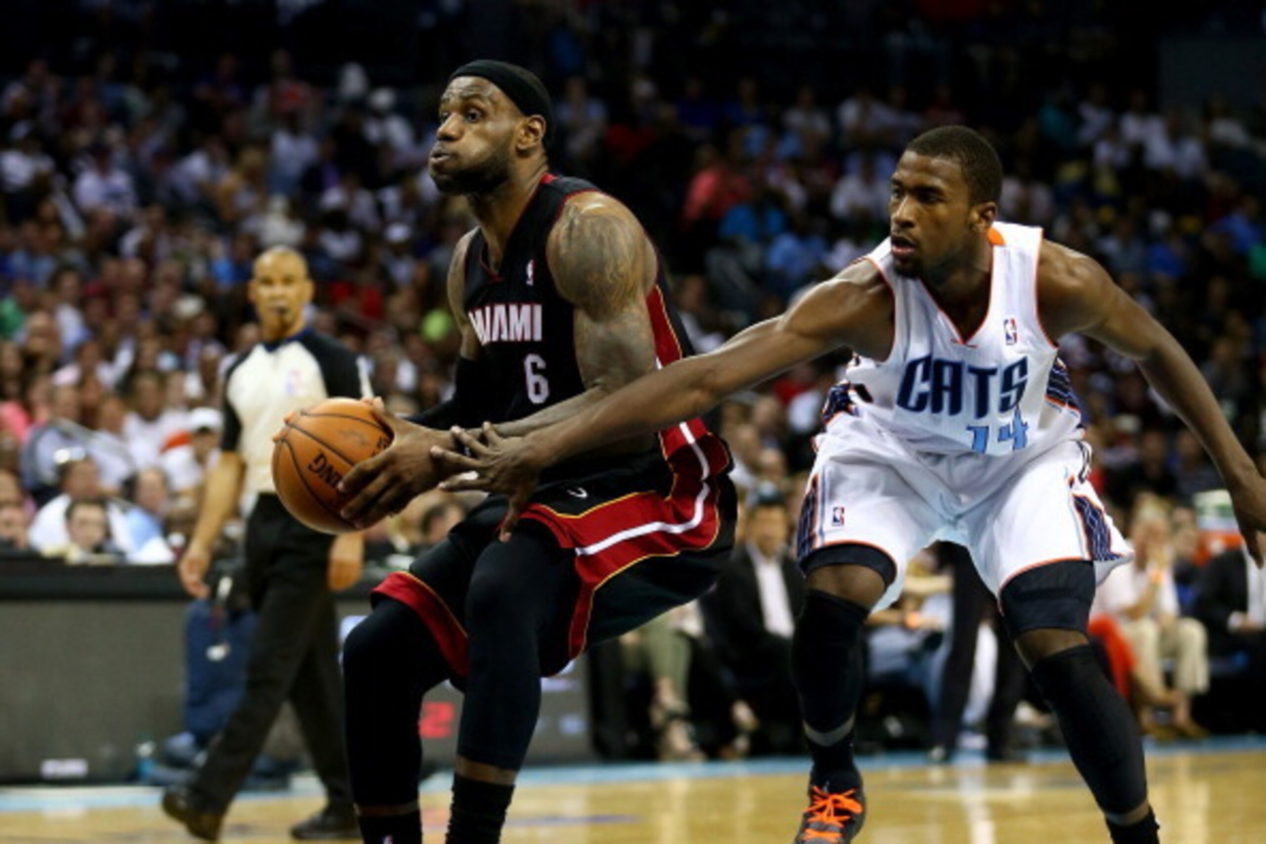 CHARLOTTE, NC - APRIL 28: Michael Kidd-Gilchrist #14 of the Charlotte Bobcats and LeBron James #6 of the Miami Heat in Game Four of the Eastern Conference Quarterfinals during the 2014 NBA Playoffs at Time Warner Cable Arena on April 28, 2014 in Charlott CHARLOTTE, NC - APRIL 28: Michael Kidd-Gilchrist #14 of the Charlotte Bobcats and LeBron James #6 of the Miami Heat in Game Four of the Eastern Conference Quarterfinals during the 2014 NBA Playoffs at Time Warner Cable Arena on April 28, 2014 in Charlott