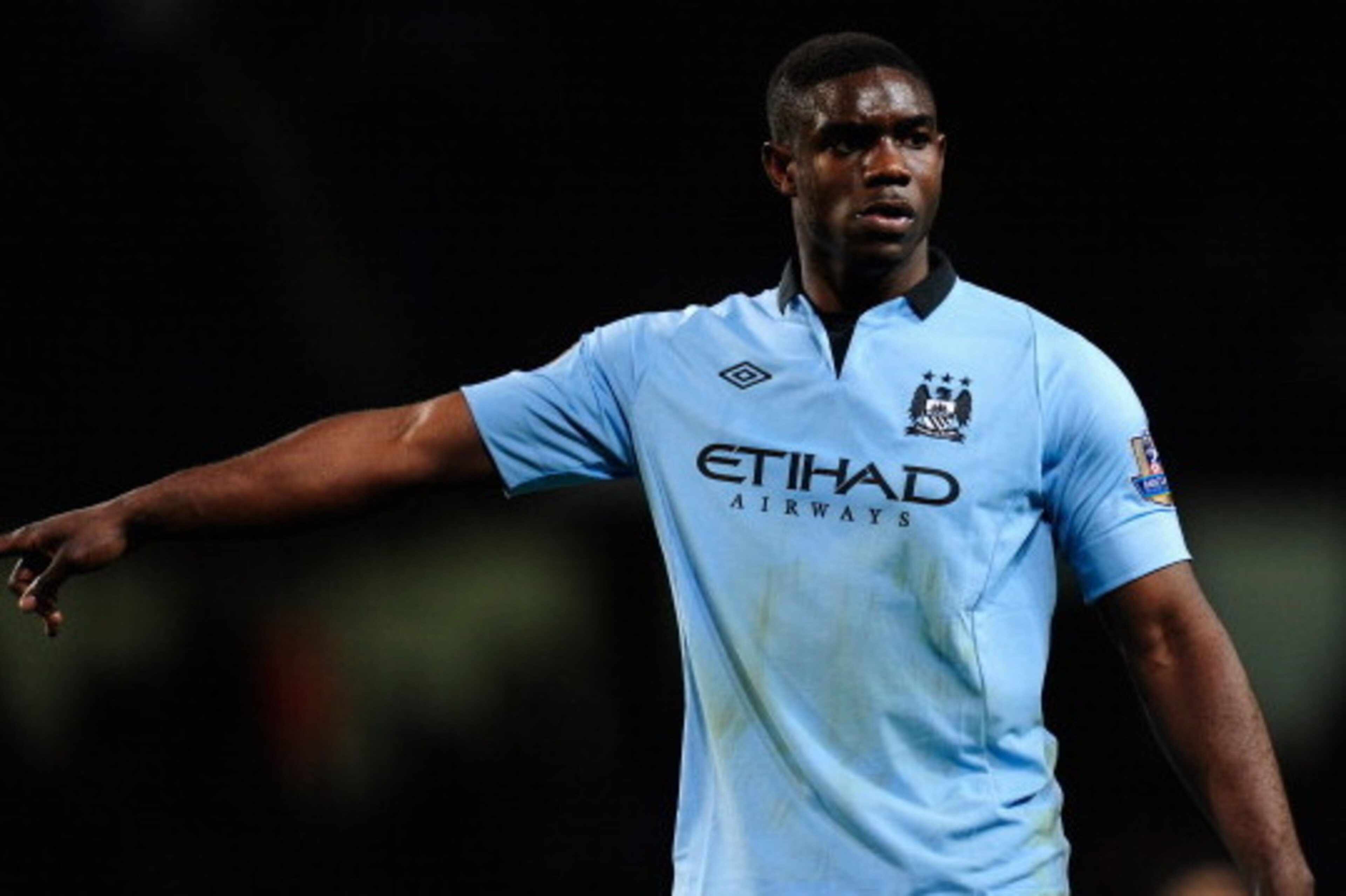 MANCHESTER, ENGLAND - APRIL 17:  Micah Richards of Manchester City gestures during the Barclays Premier League match between Manchester City and Wigan Athletic at the Etihad Stadium on April 17, 2013 in Manchester, England.  (Photo by Stu Forster/Getty Im